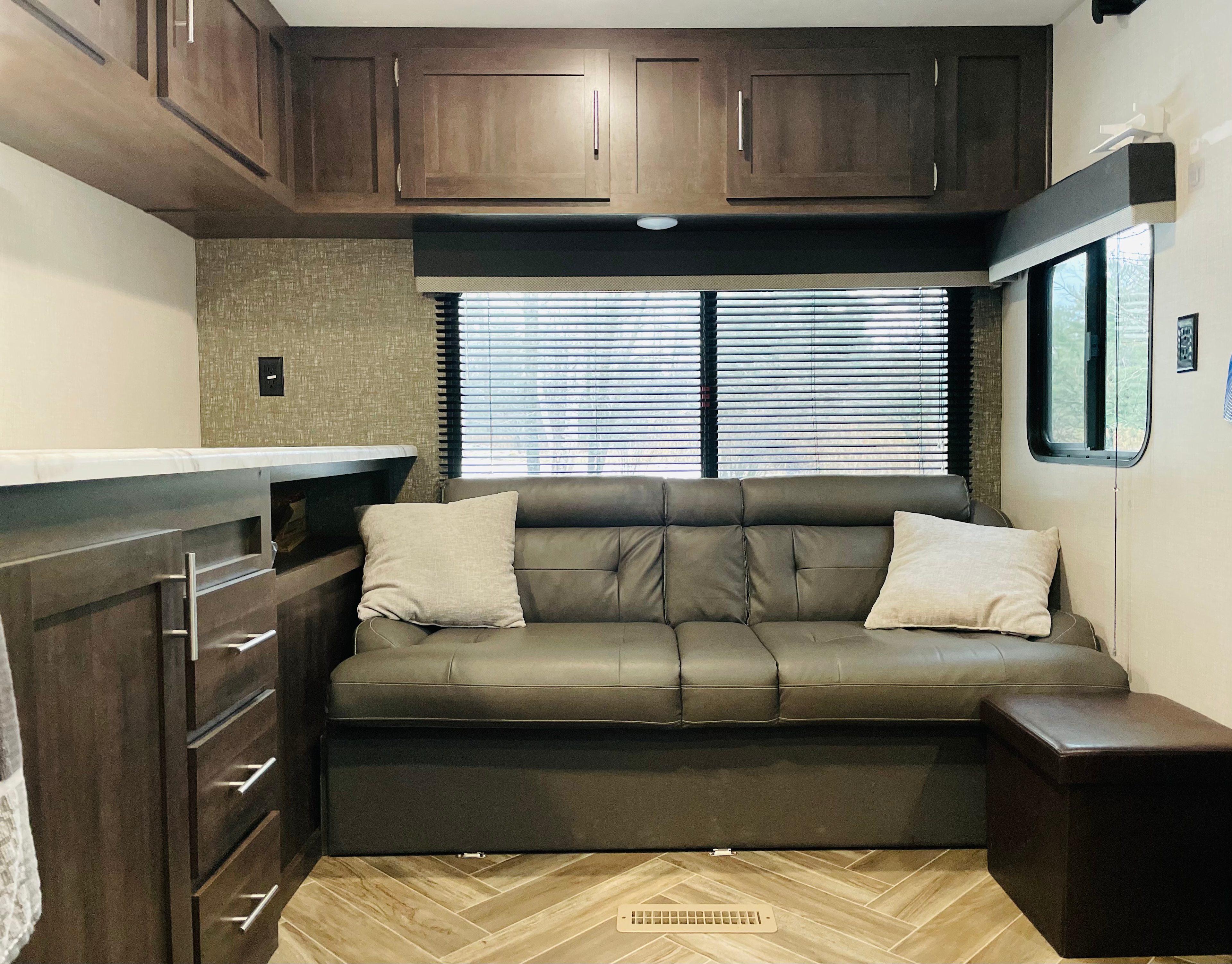 Couch turns into a bed (full size)
Clean linens/blankets and pillows available. 