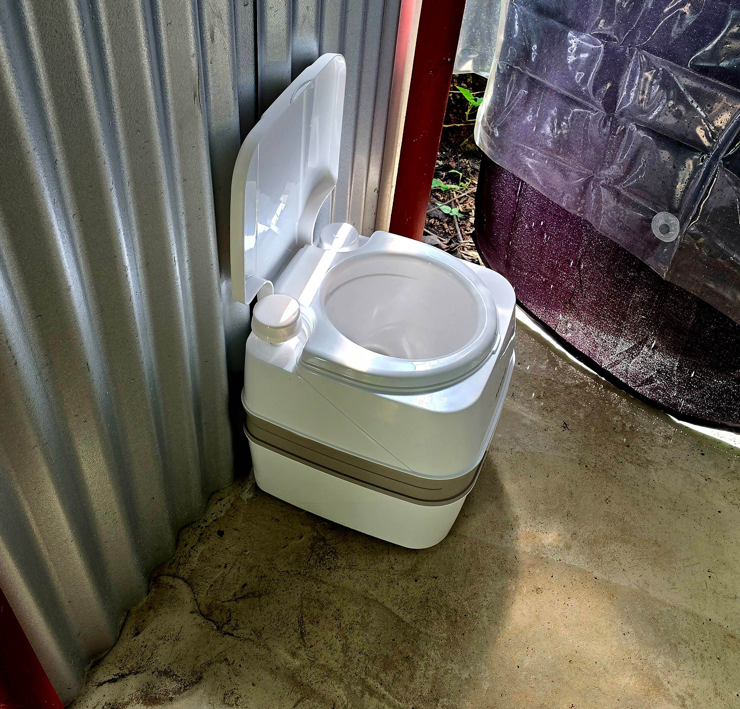 Portable, flushing toilet available for rent.  McD's and BKing in town 5 minutes away, if you'd rather.  Or bring your own set up.