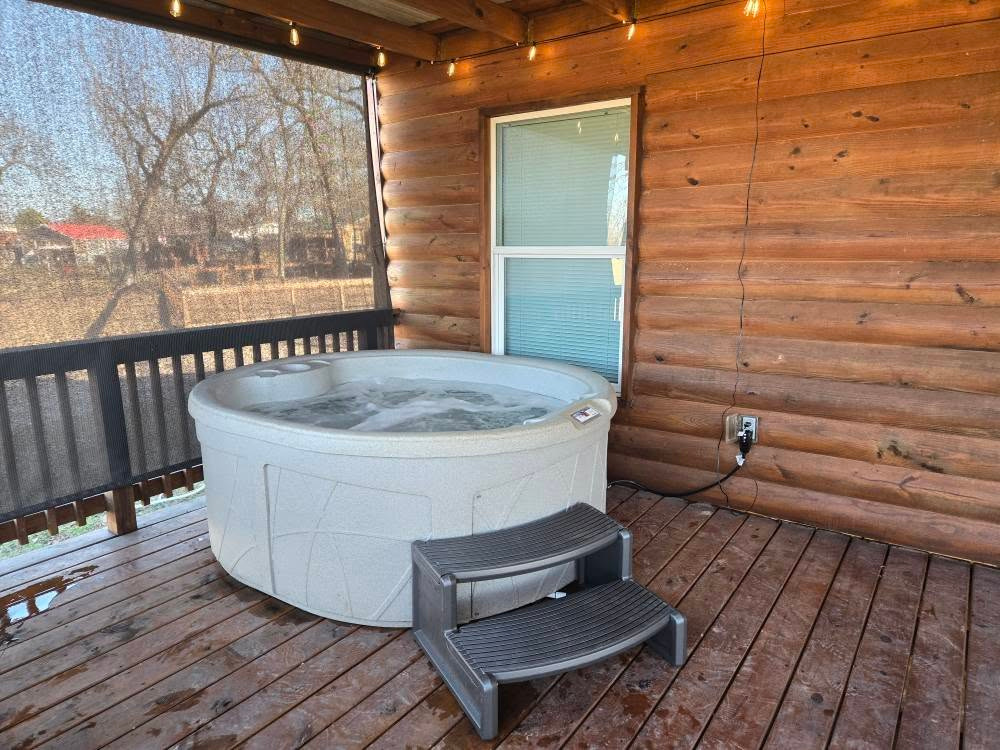 Private hot tub on front porch