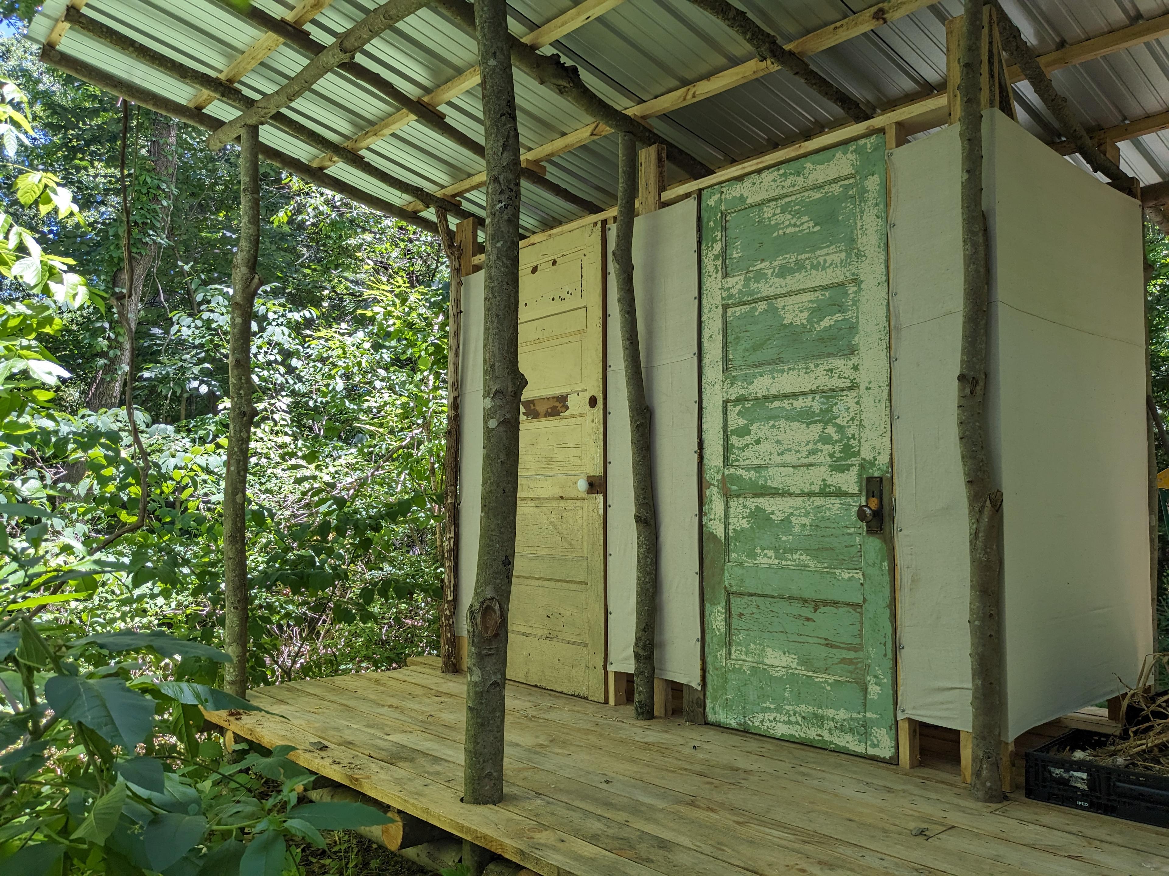 Out house that was lovingly timber framed from local maple poles. It is a composting system with two stalls. Guests will also get to peruse our curated rock collection located on shelves inside! 