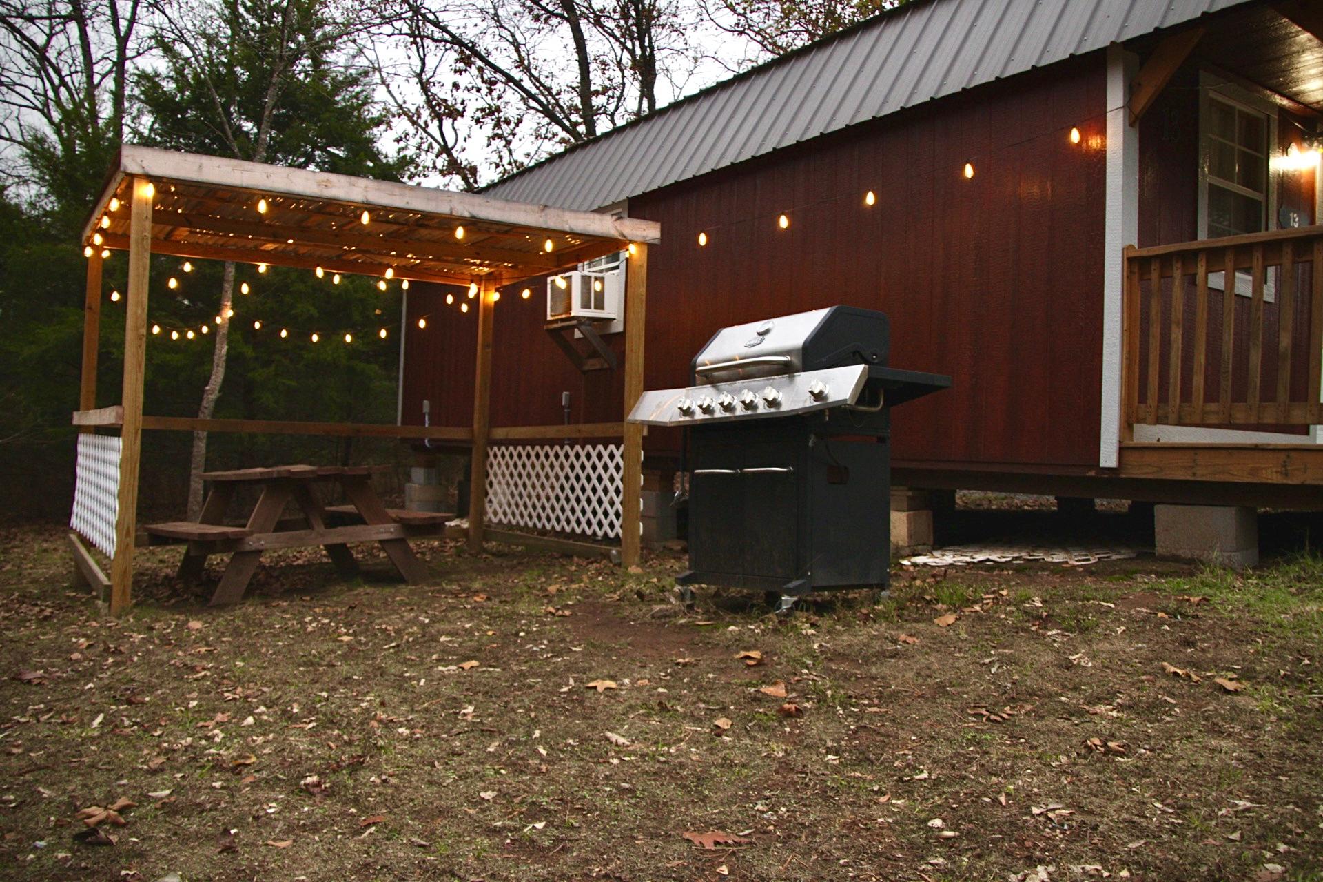 Cabin 13 outdoor grill and dining area