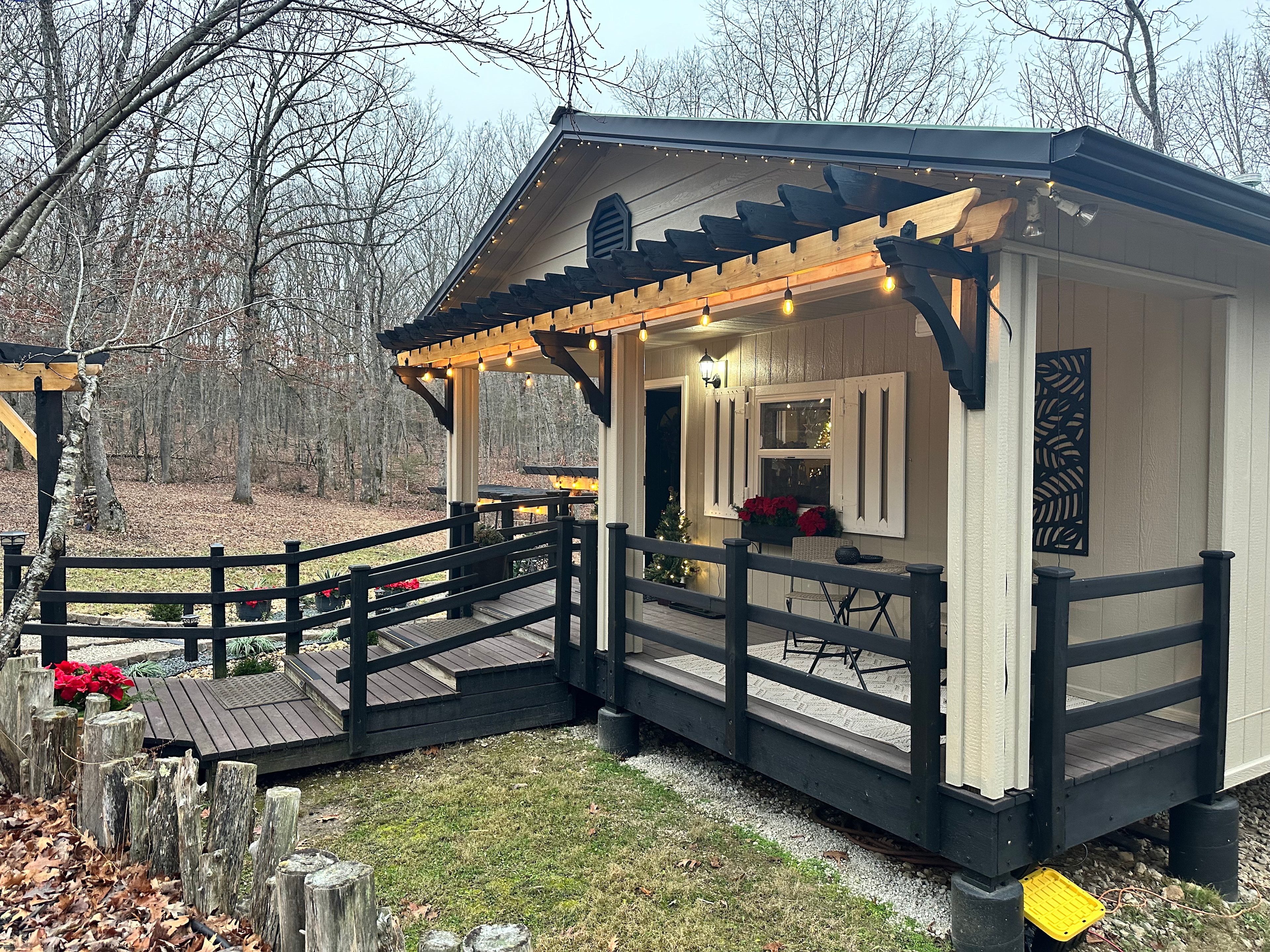 The Front Porch of the Arbor Cabin, also showing steps.