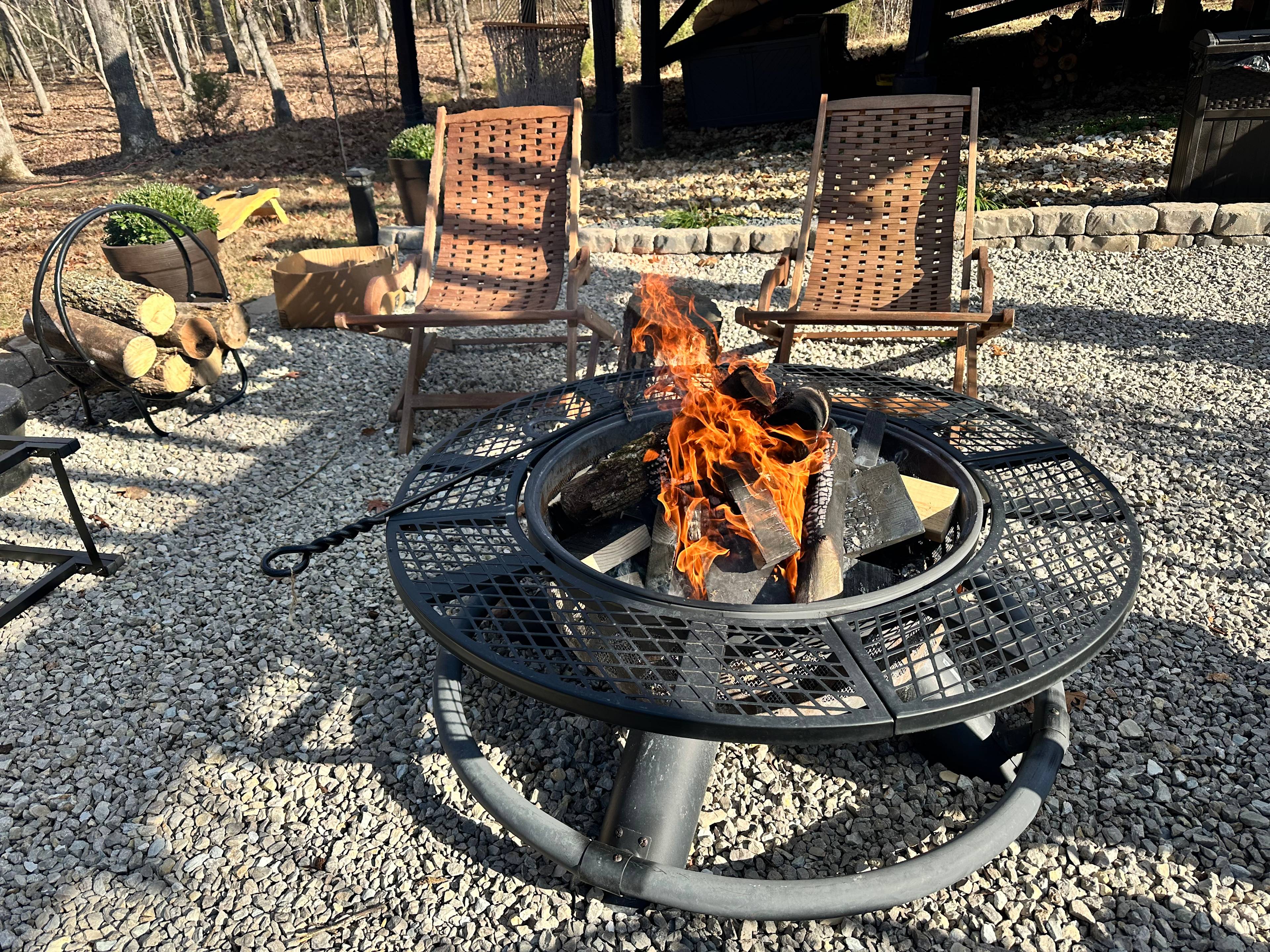 Outdoor Fire pit with provided S'more's Kit and plenty of firewood.
