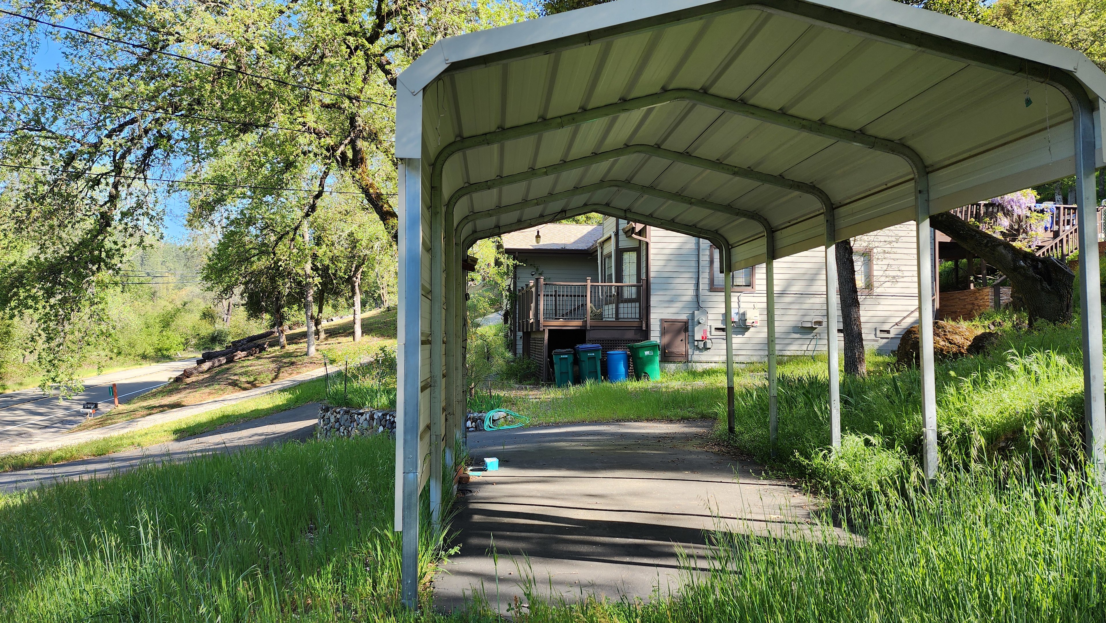 Covered RV Parking Under Oak Trees