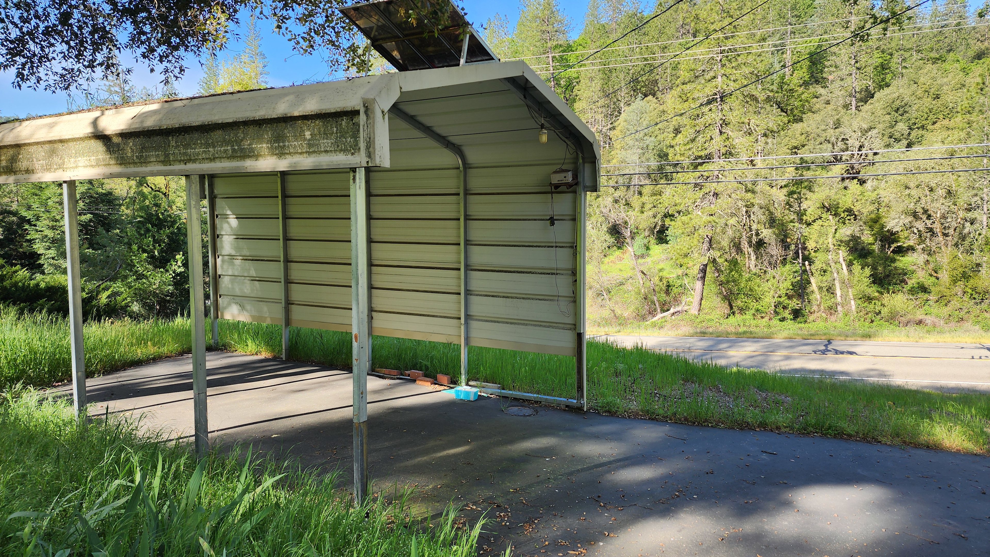 Covered RV Parking Under Oak Trees
