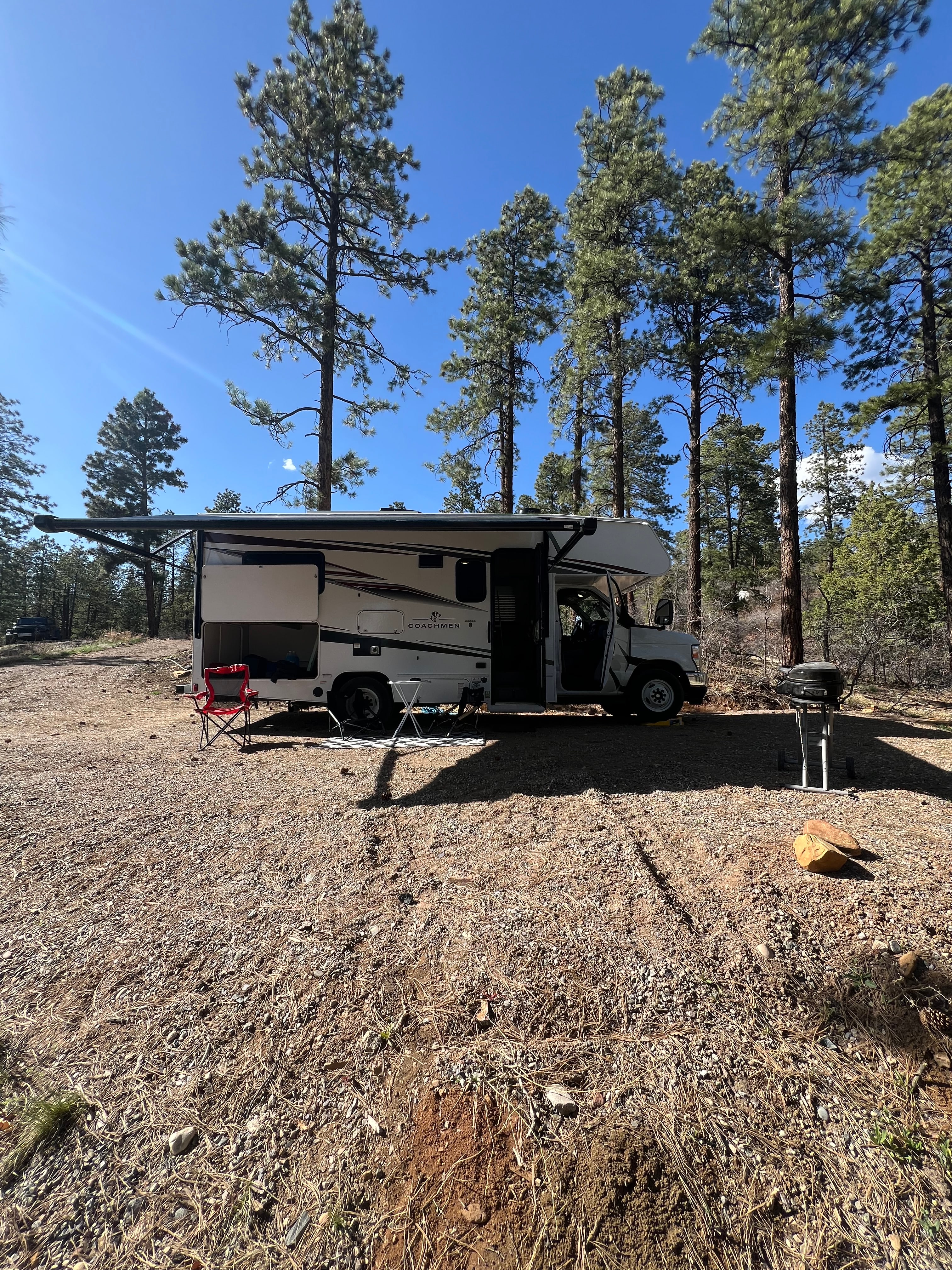 25ft class C. Level spot with hookups 