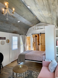 Queen size Murphy Bed folds down from the wall. 