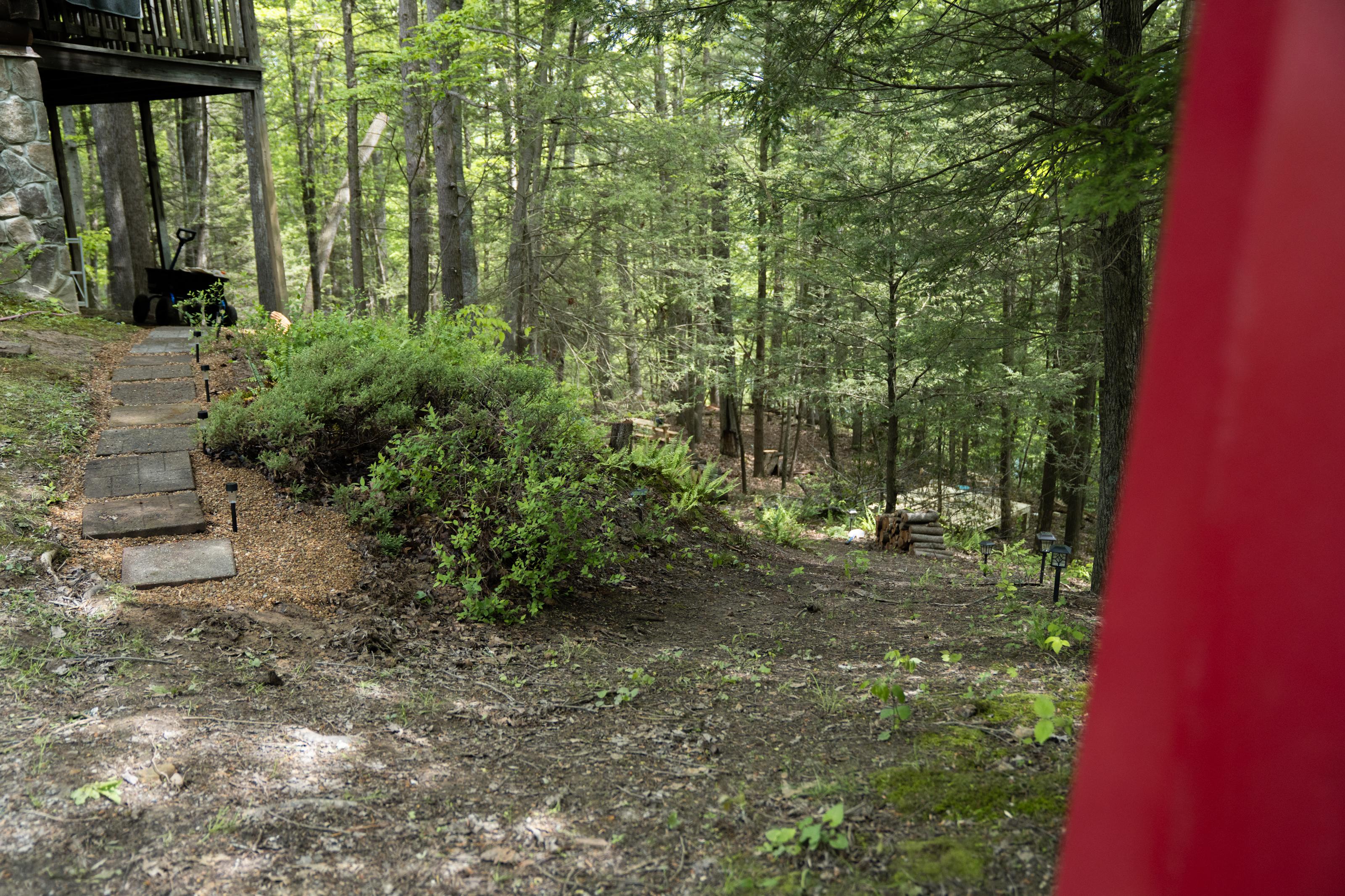 View from the top of our (shared) driveway -- head down the hill to camp! Or walk the path to the coffee bar / amenity station. 