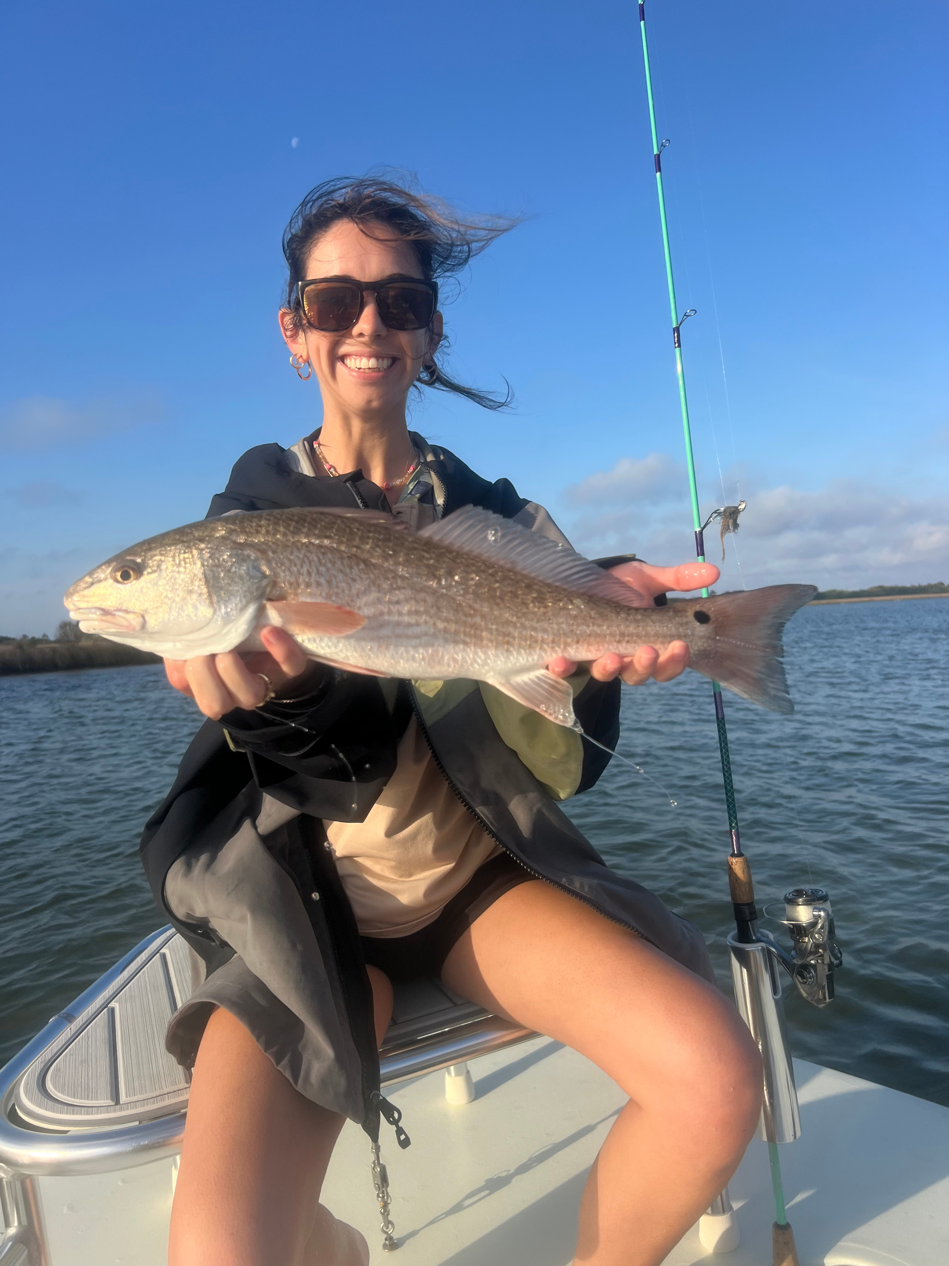 Guest Ansley with her 1st redfish of the day