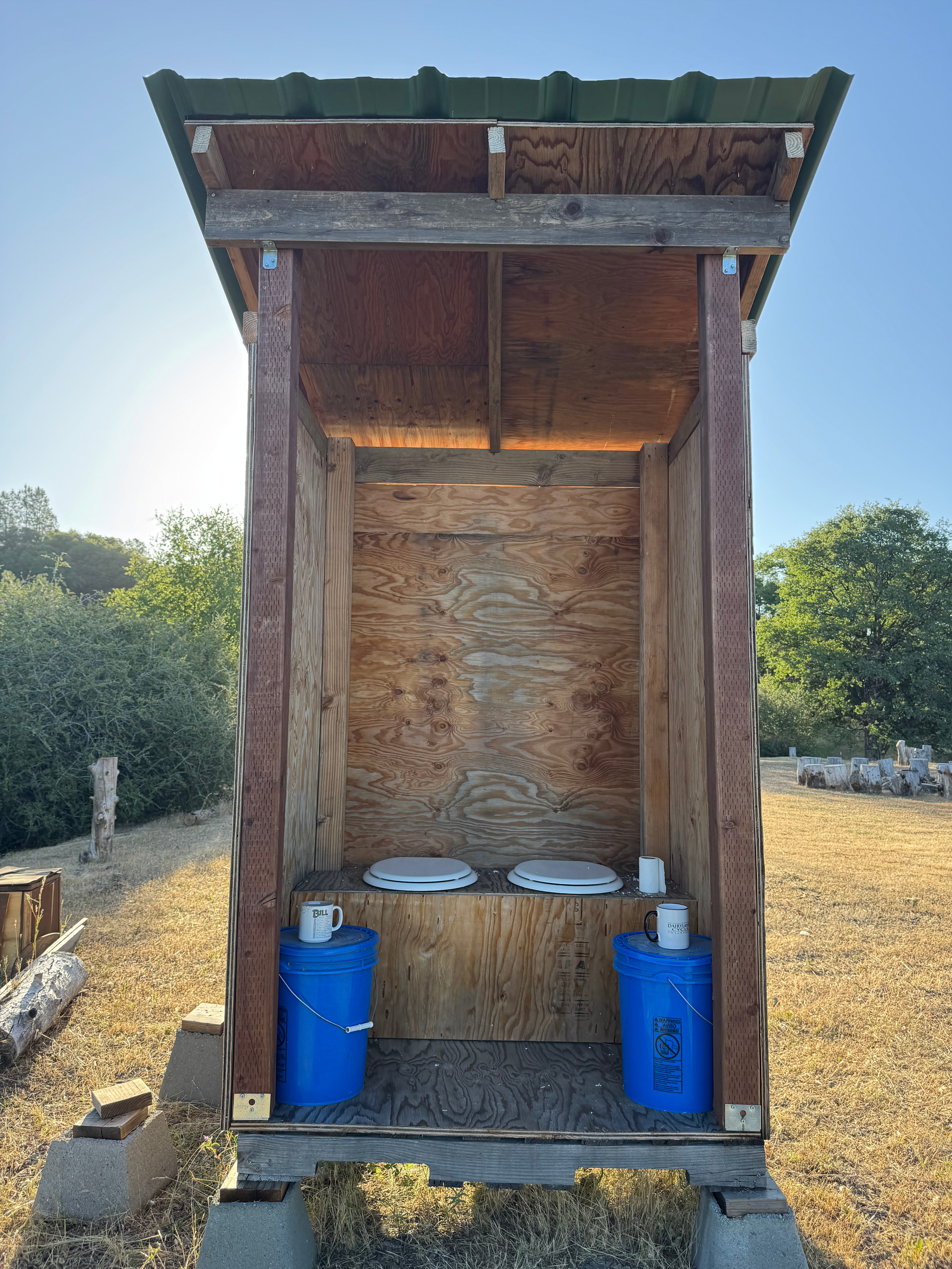 Compost toilet is on the edge of the site for some privacy, with a nice view out into the valley