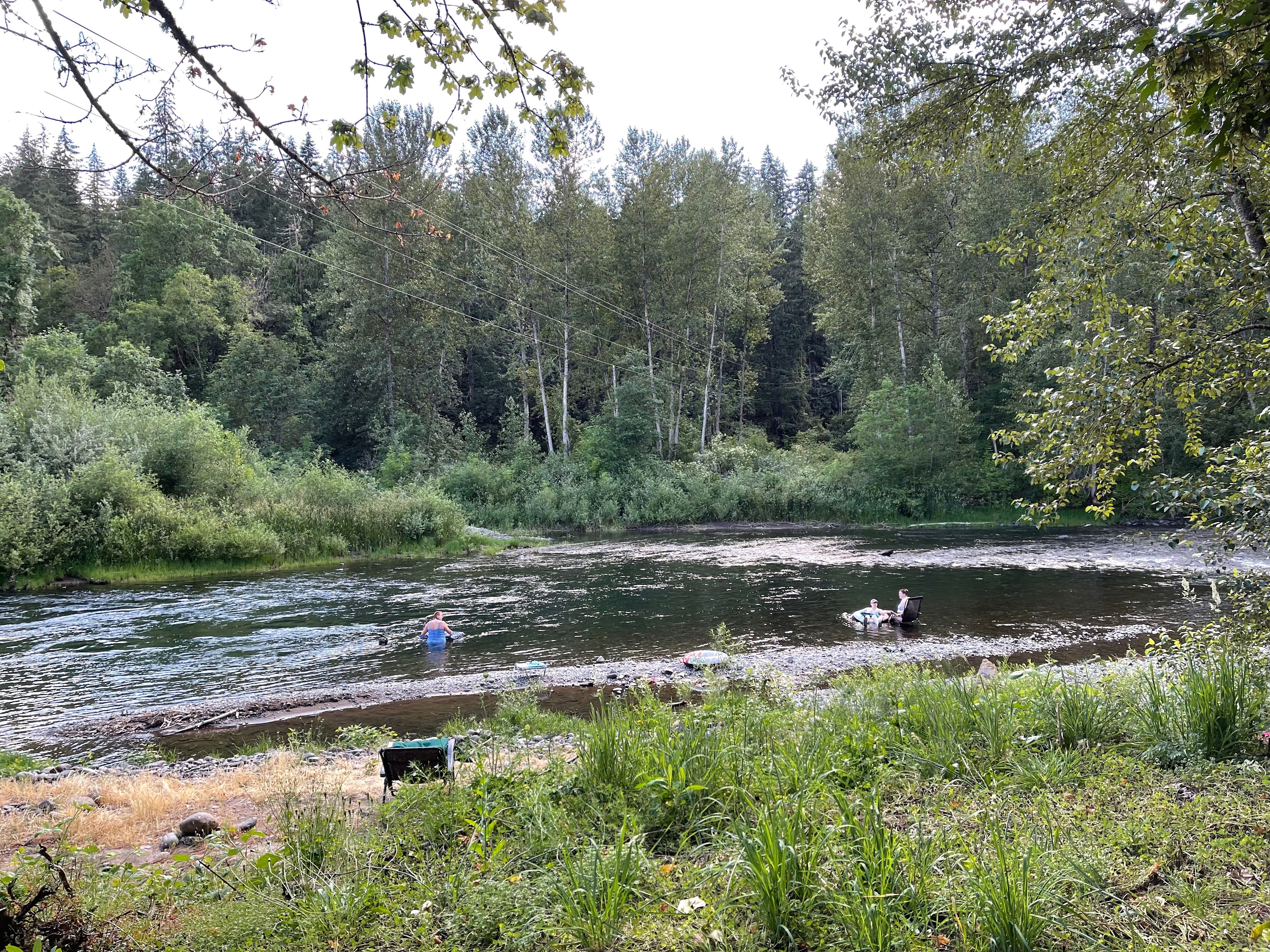 People enjoying the river.