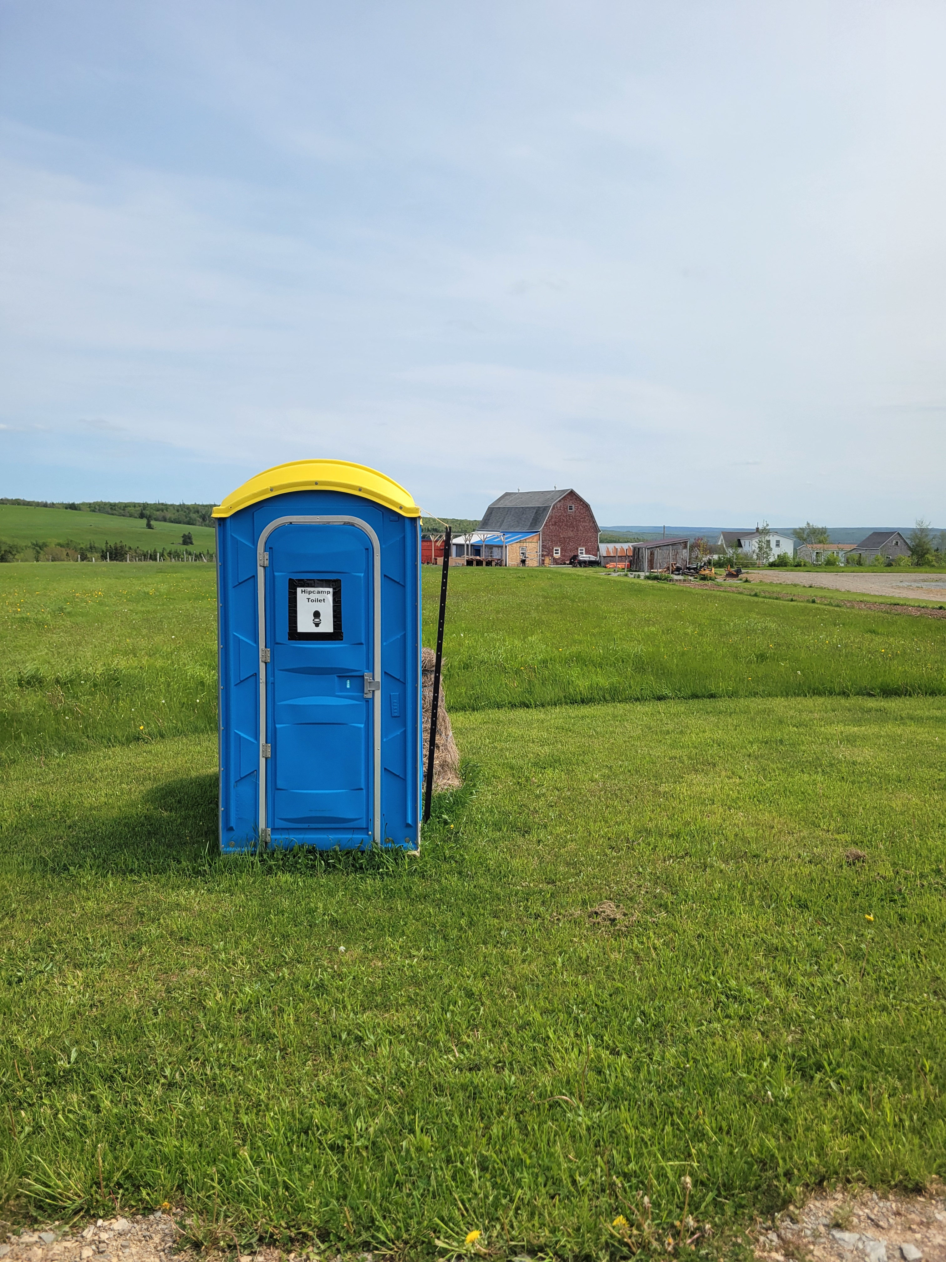 The portable toilet for Hipcampers.   Our farmstead in the distance.
