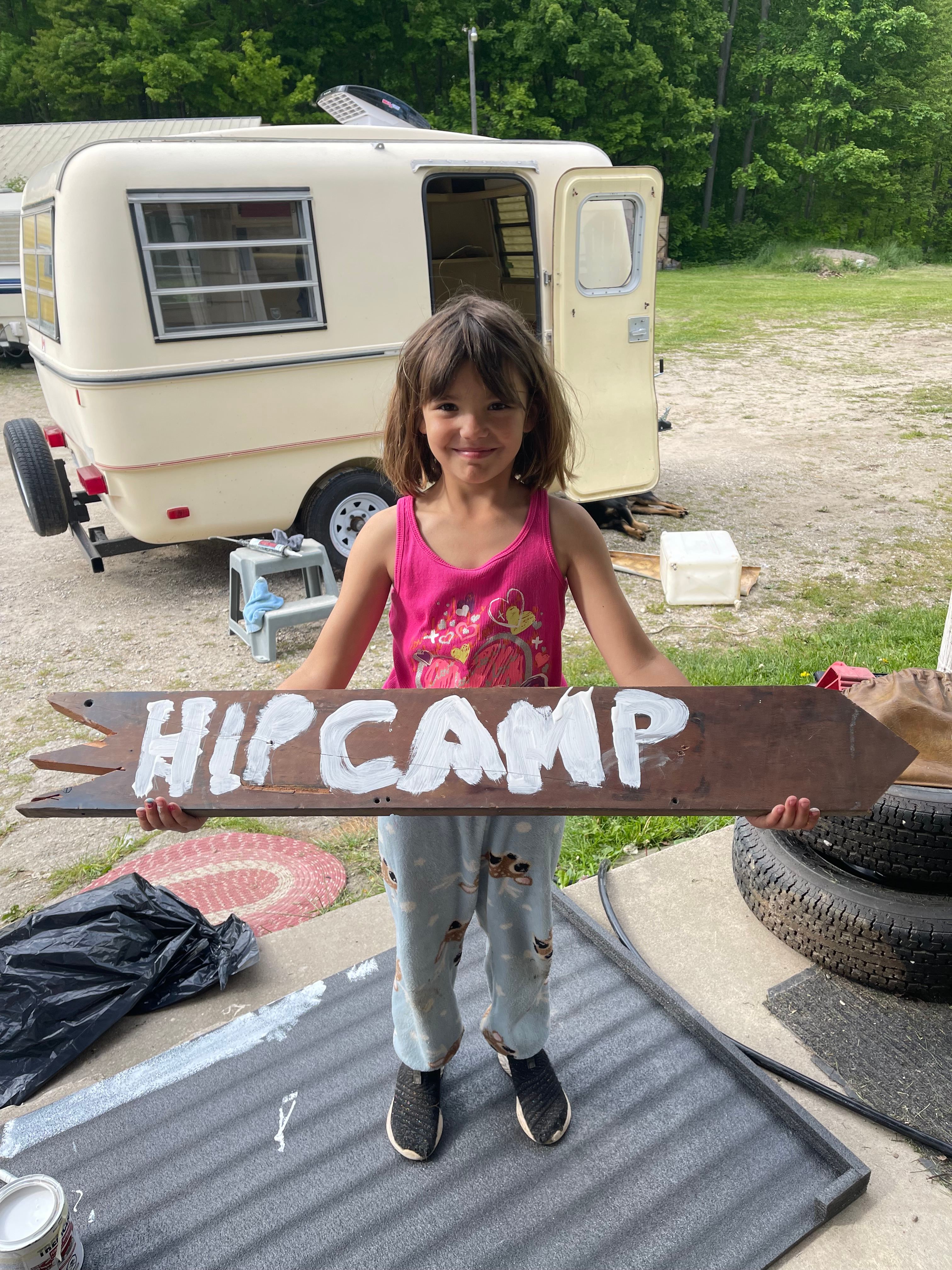 Sophya one of our very first campers. She made our sign. 