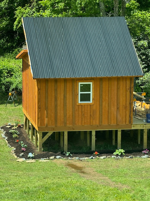 The Cozy Bear, by the stocked creek