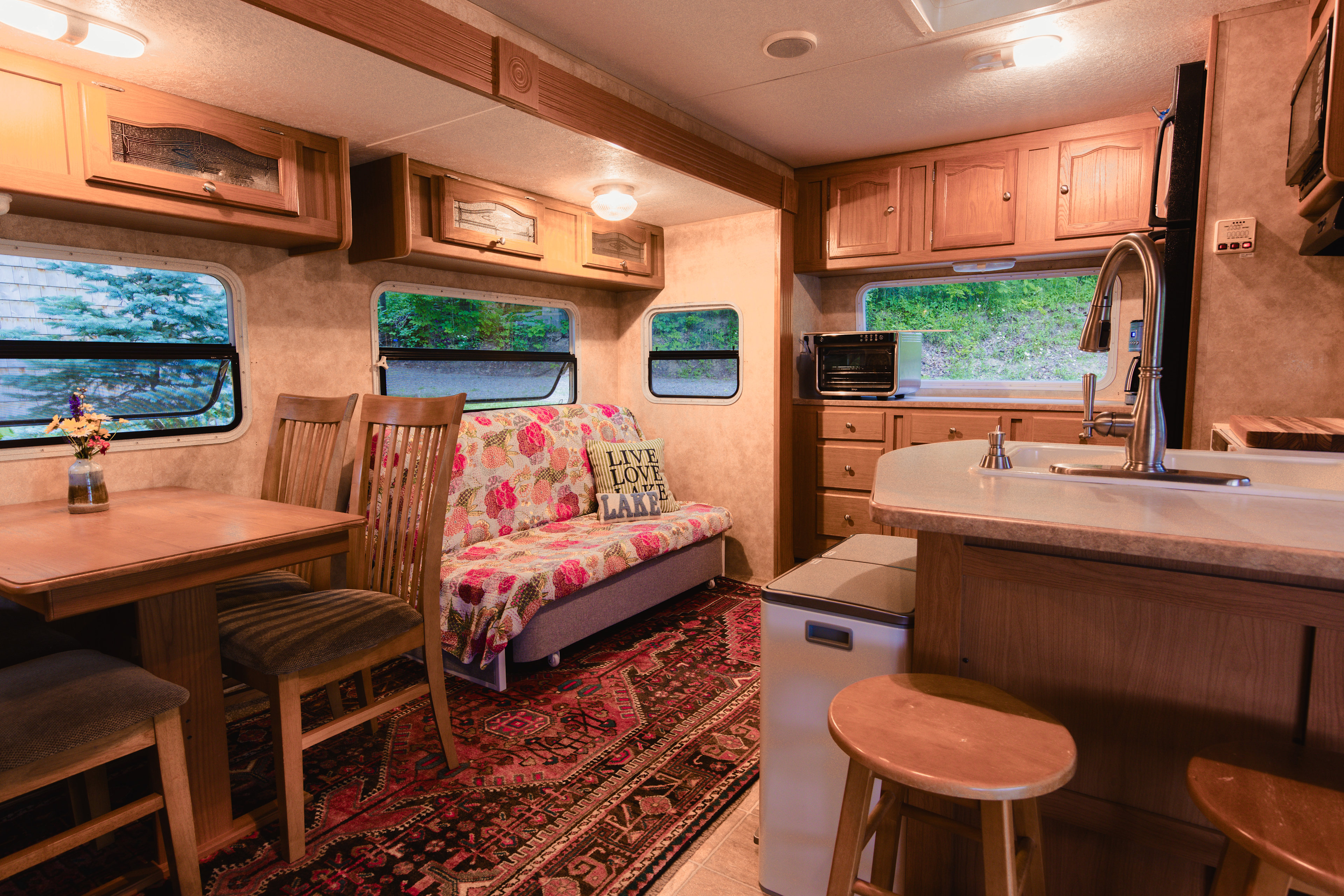 Interior of the RV which includes a pull out couch 