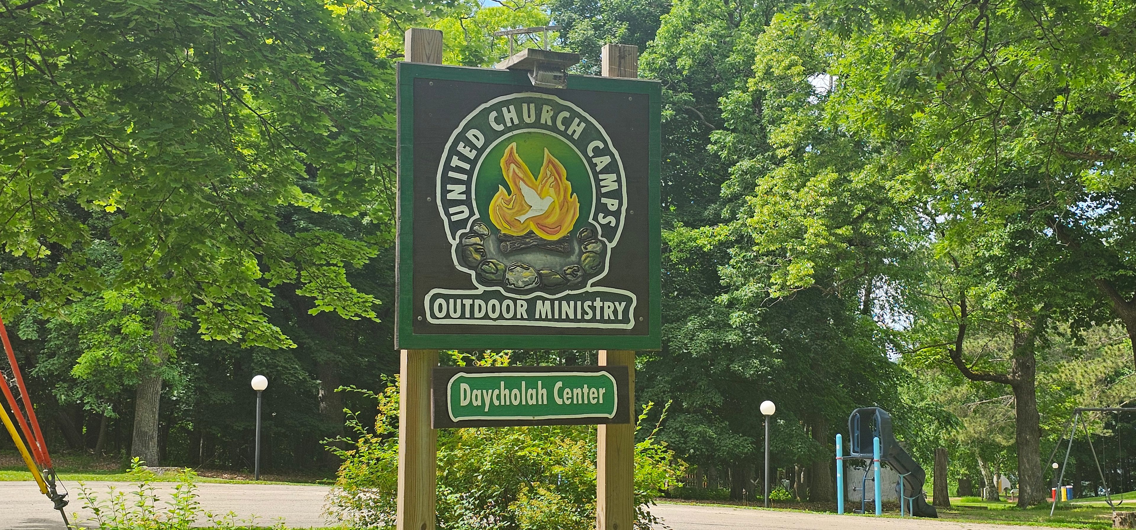 Camp sign at entrance.