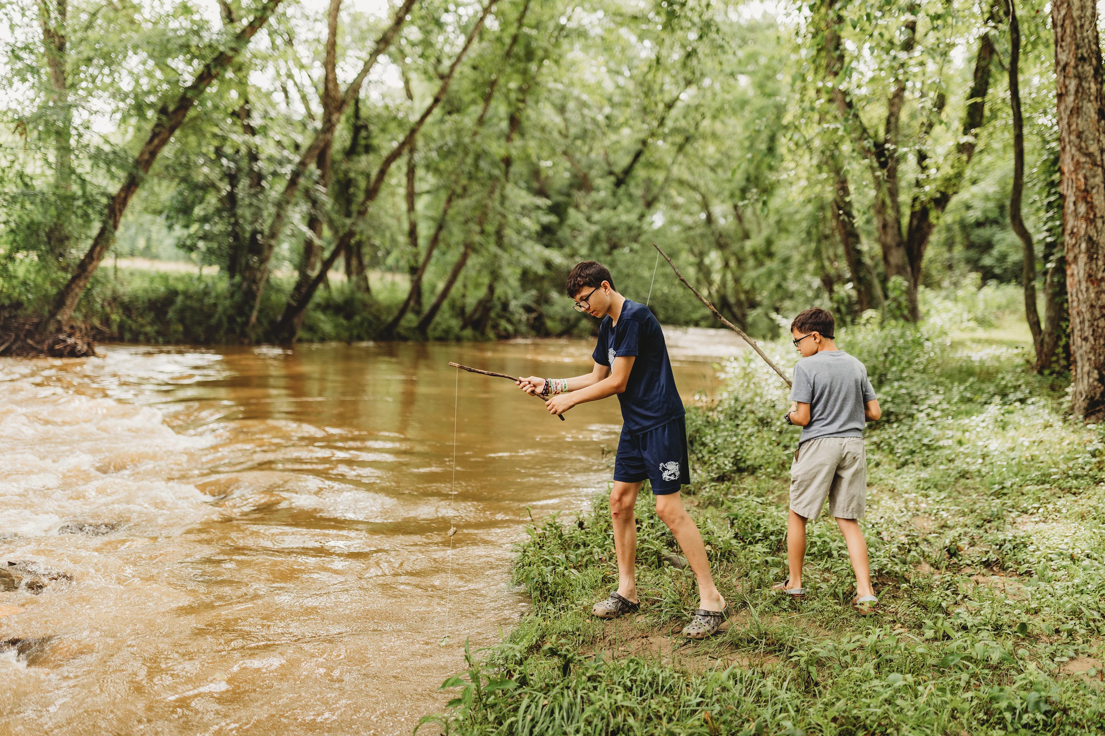 The boys had fun playing by the creek.