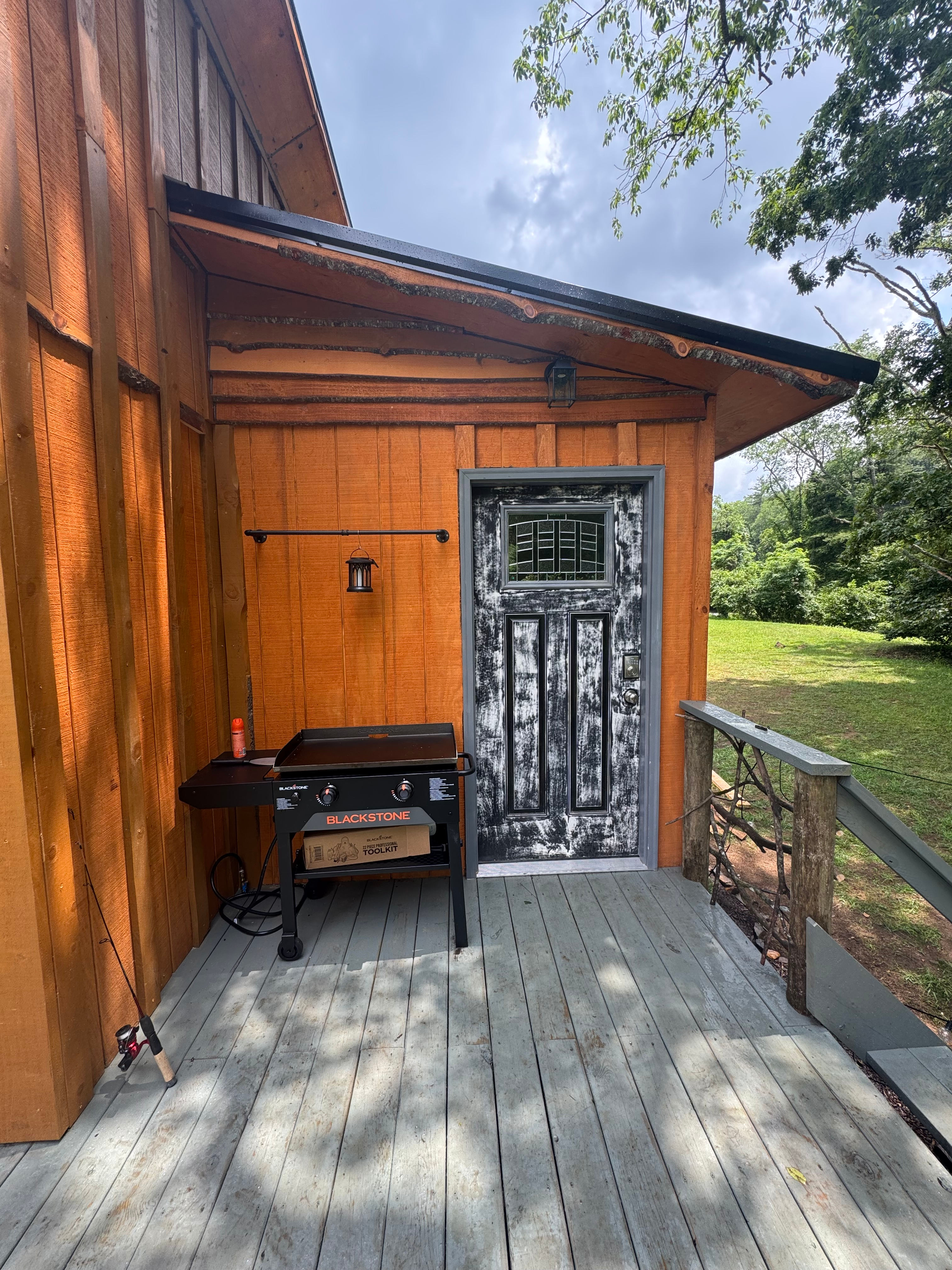 The Cozy Bear, by the stocked creek