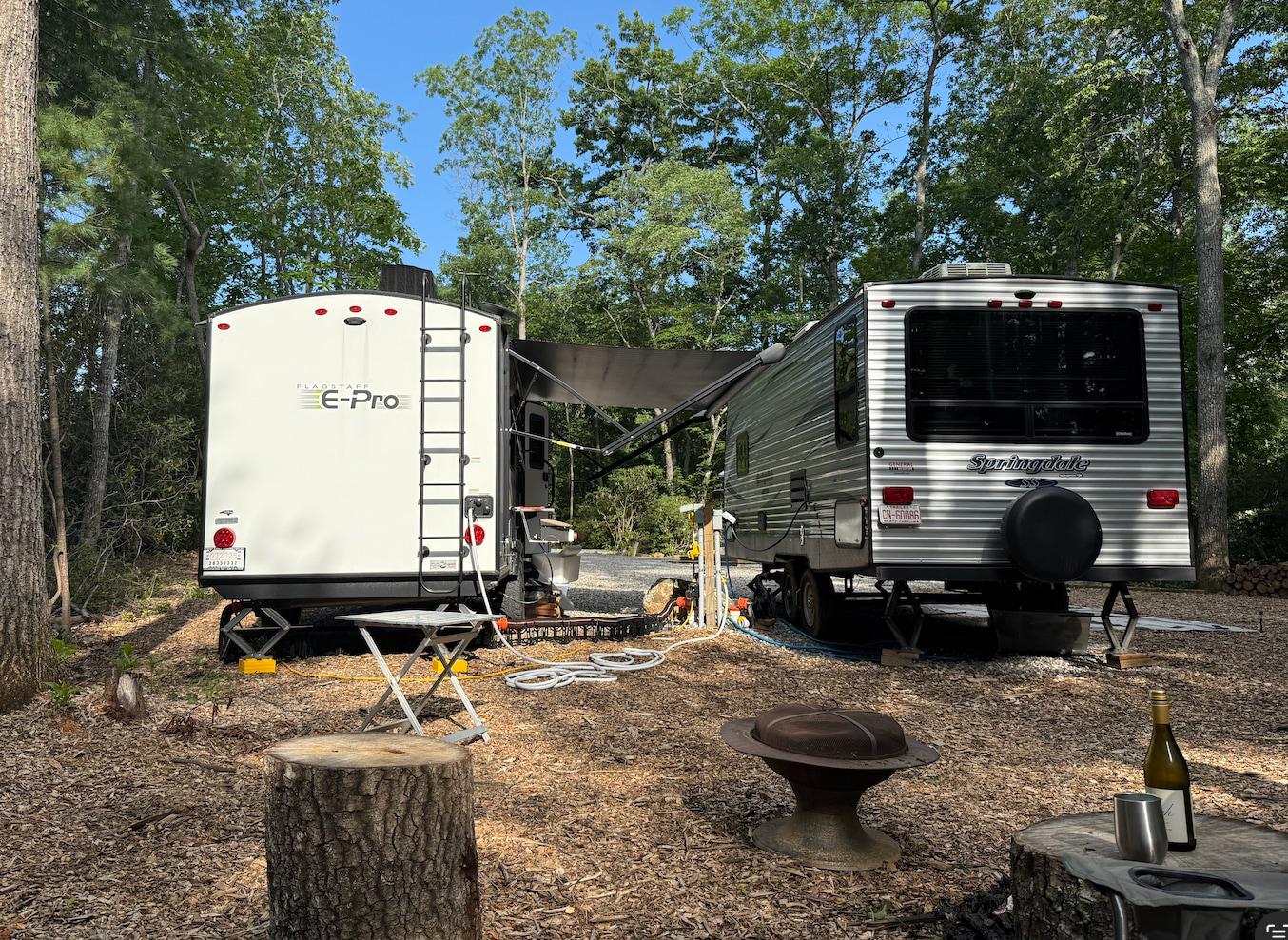 Rear view. Our camper is white, on the right facing the site, on the left in this picture.