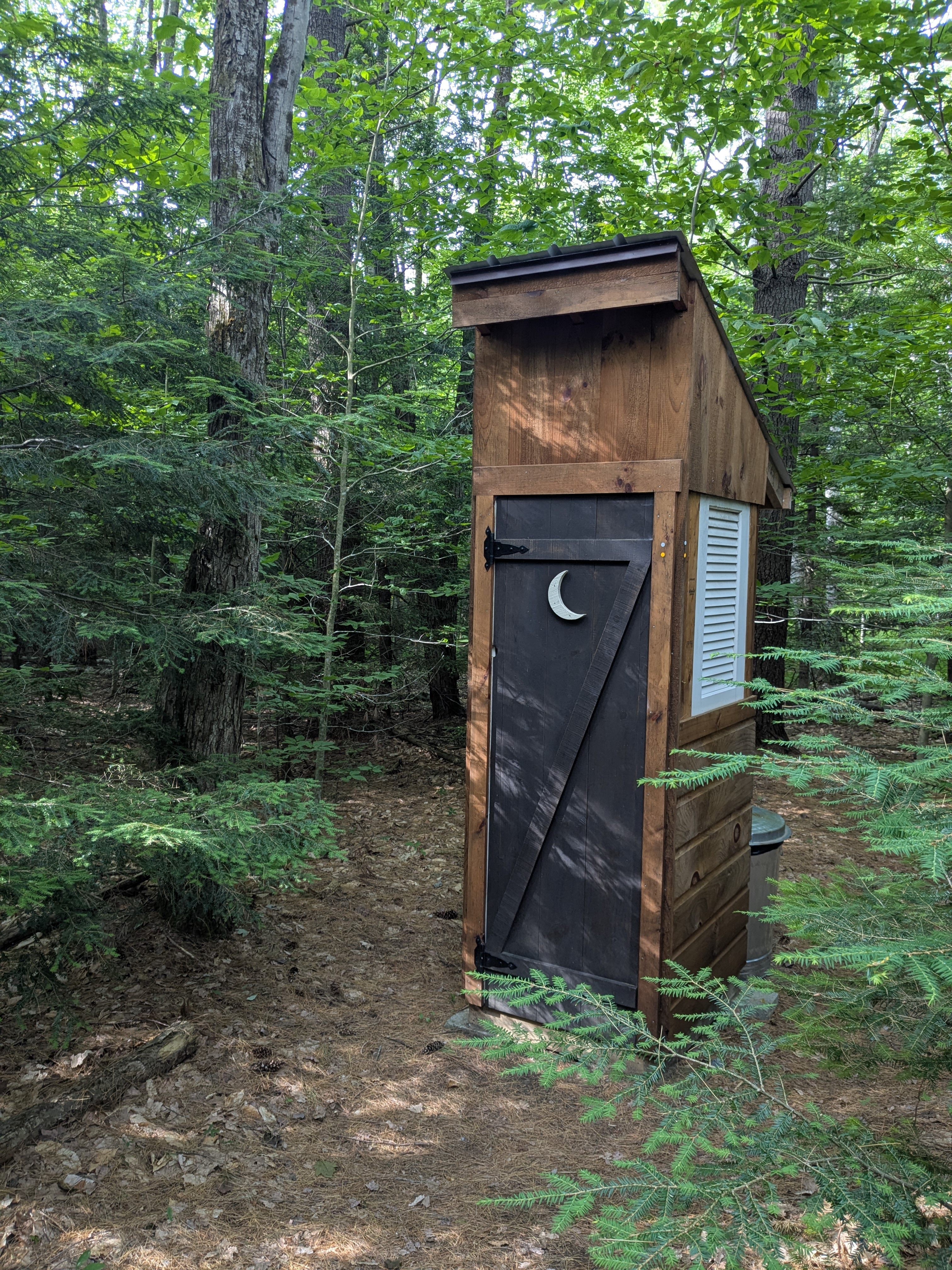 Tidiest outhouse EVER!