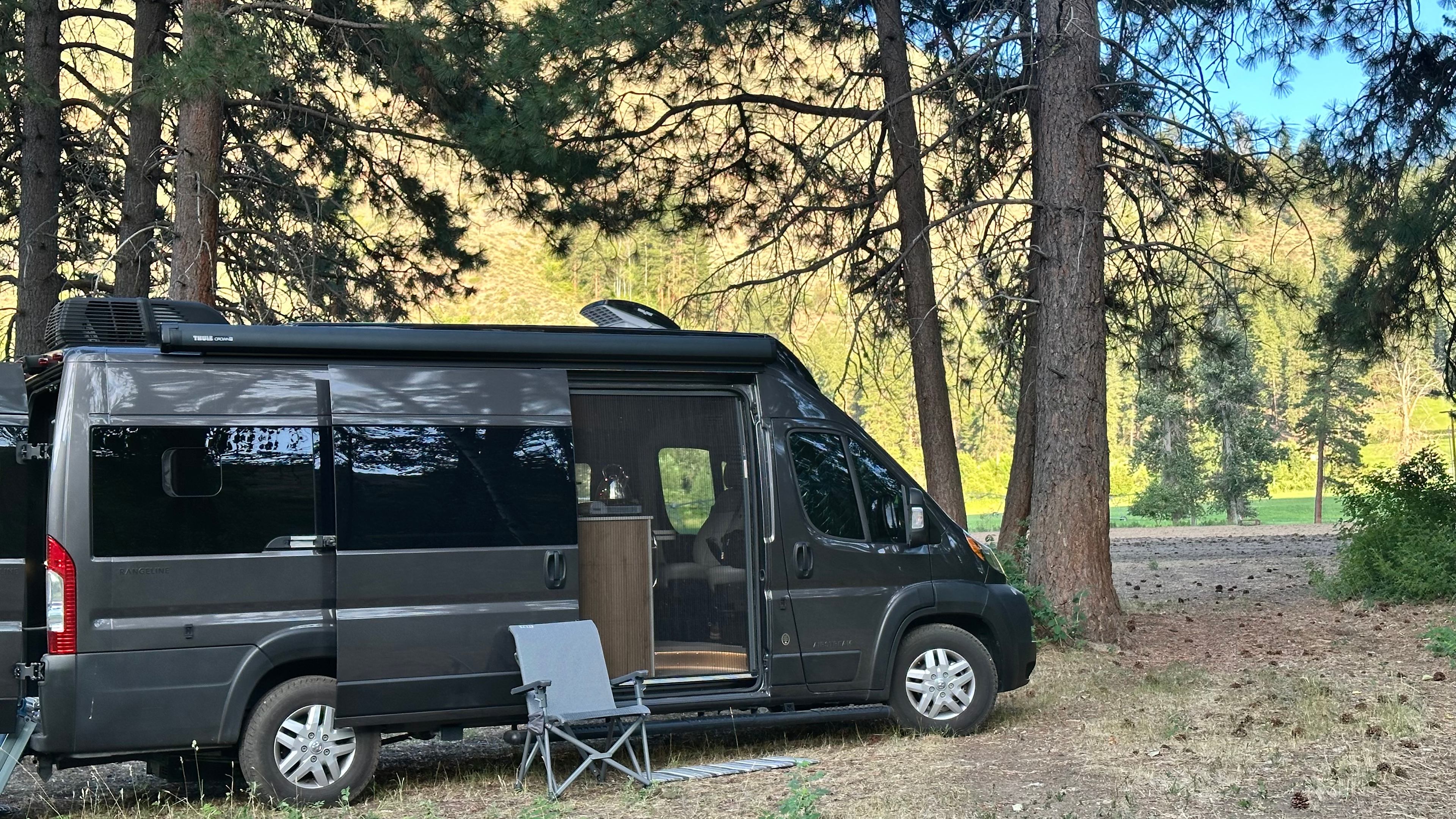 Not visible but appreciated: fire pit, two picnic tables, horse paddock