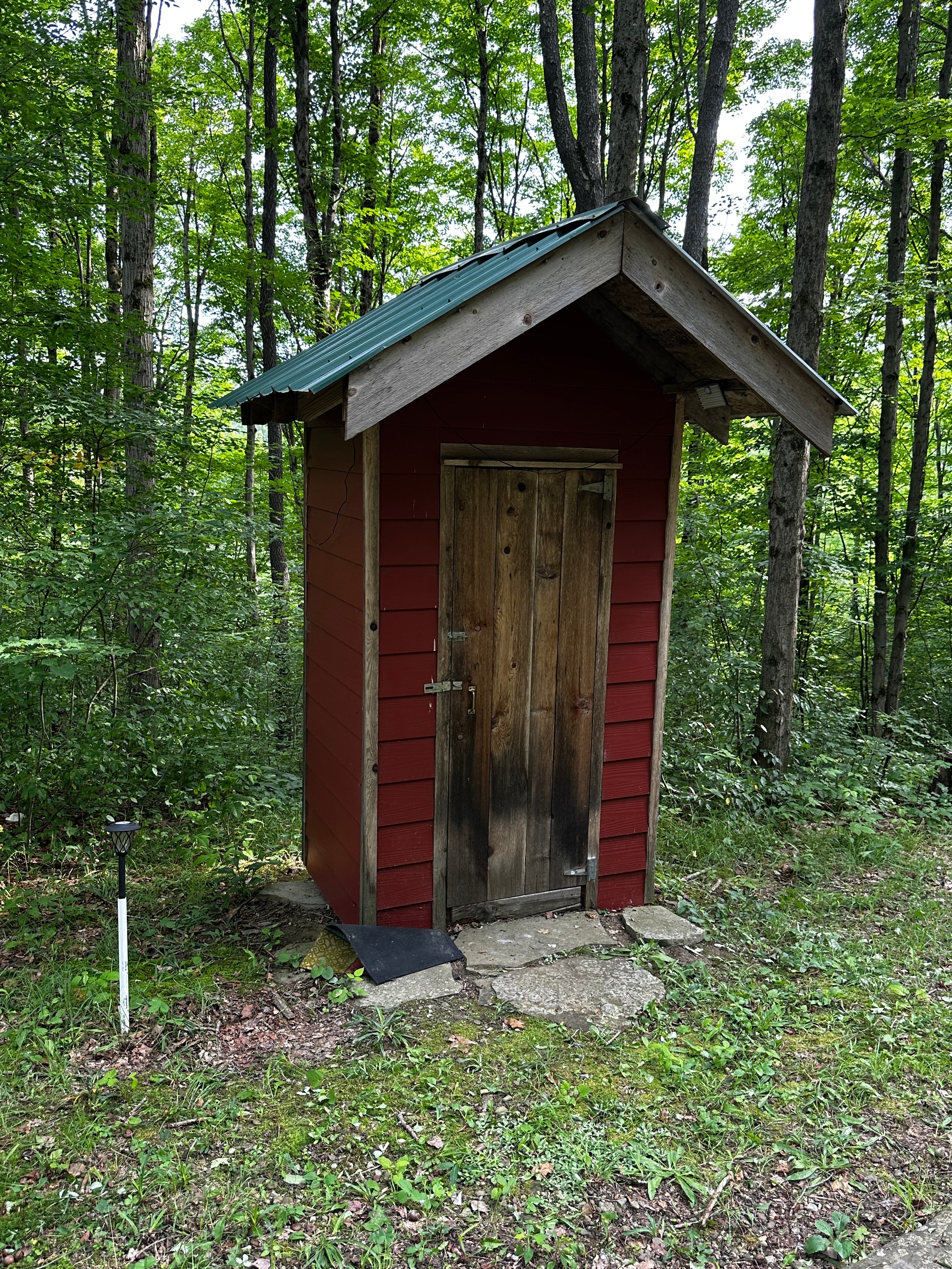 It’s not just an outhouse. It’s a compost toilet. 