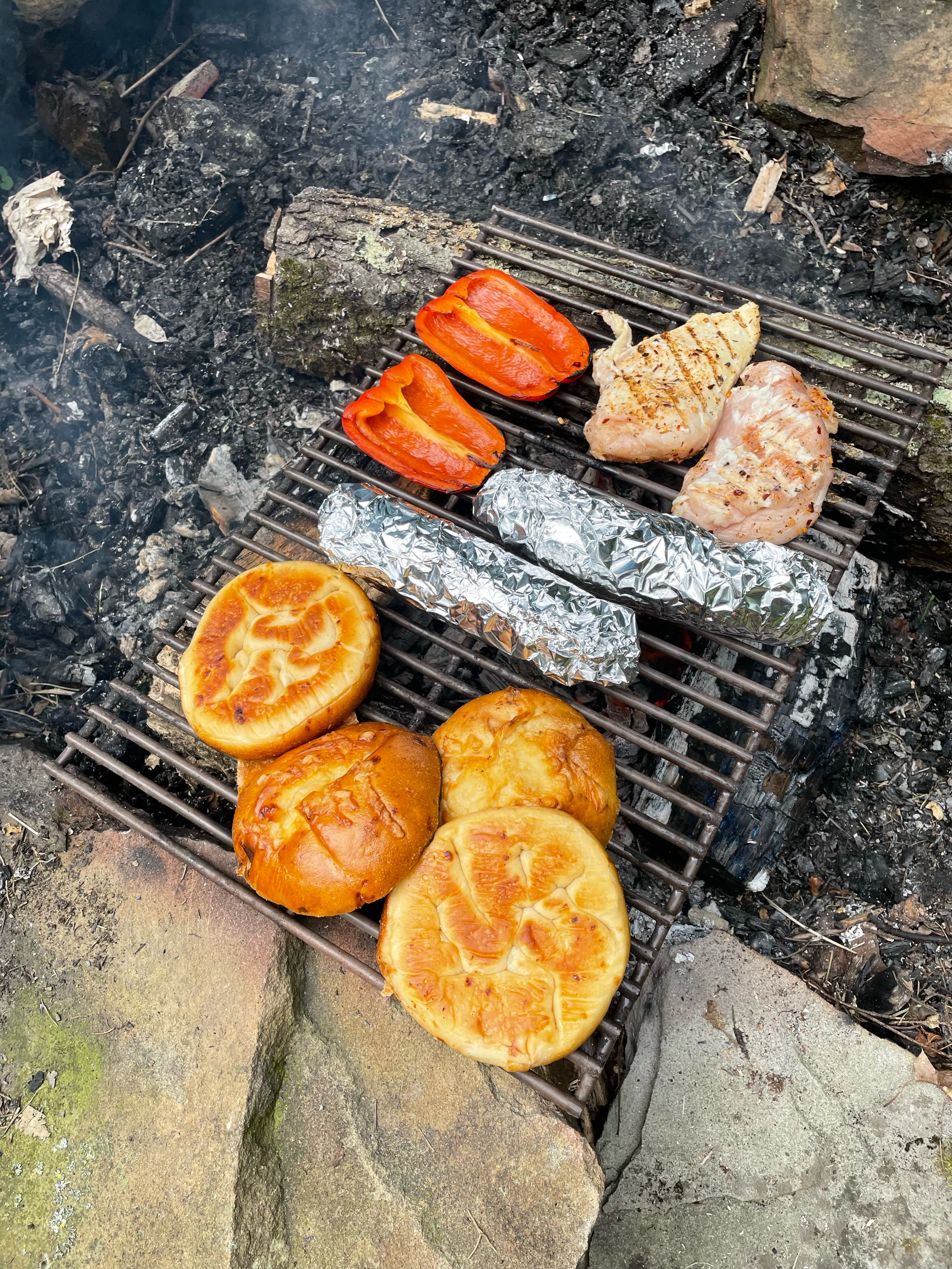 Delicious camp meal cooking on the supplied grate. 