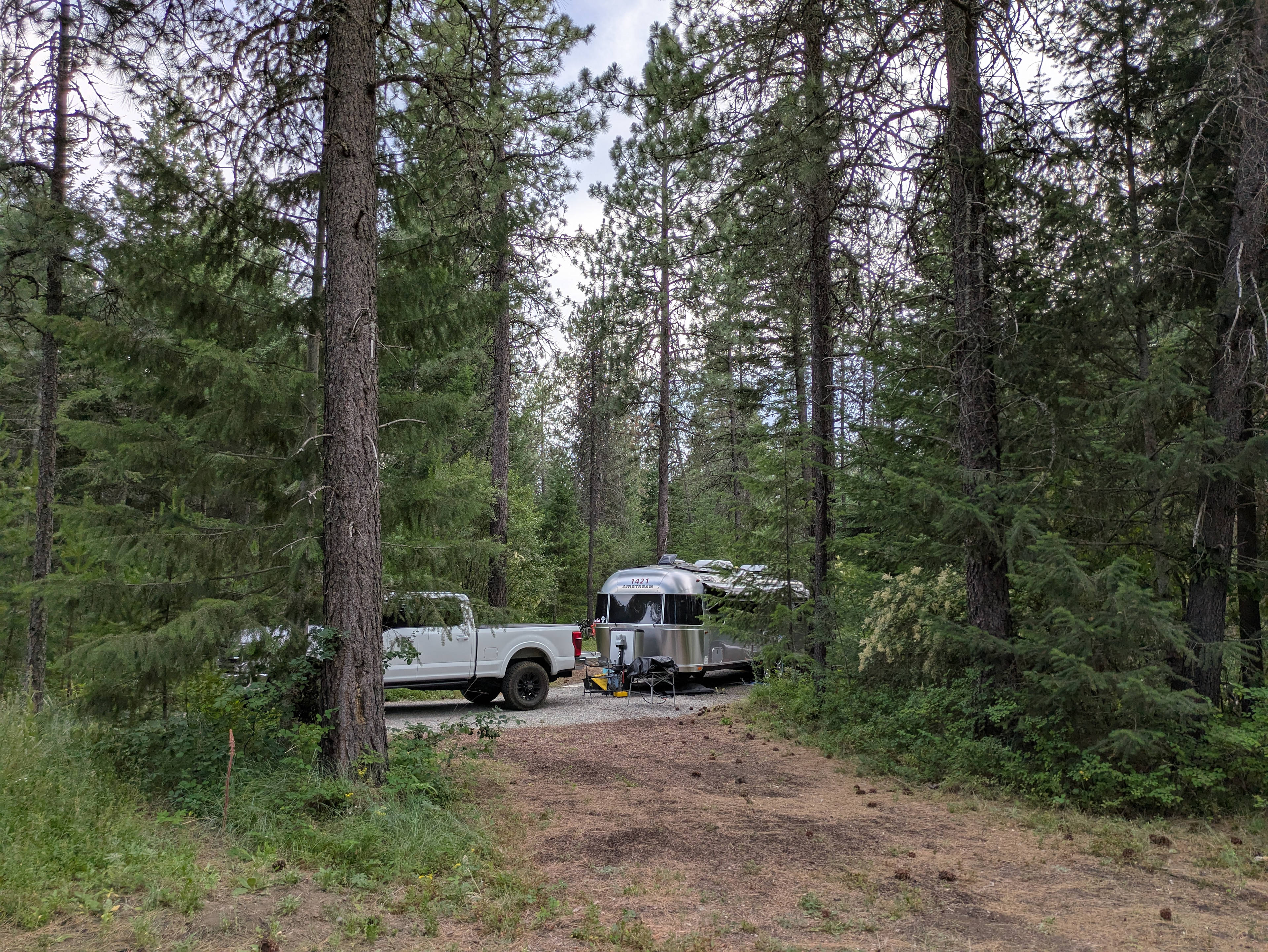 Side shot, July.  Site has a long back-in, but it's easy to navigate. Power is 30 amp. Awesome site! 