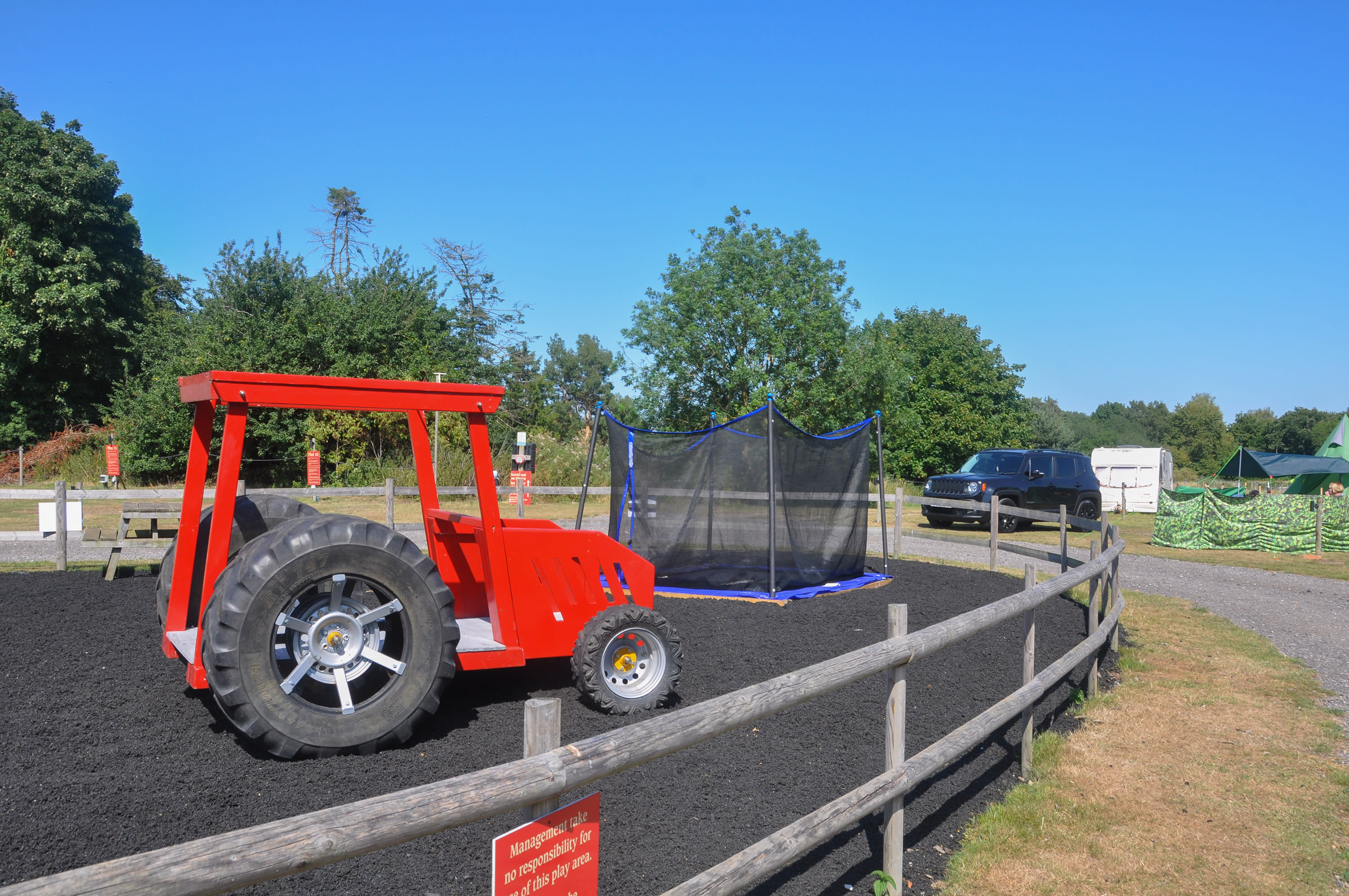 Aspect of the newly built kids playground opposite the pitch - complete with climb on tractor!