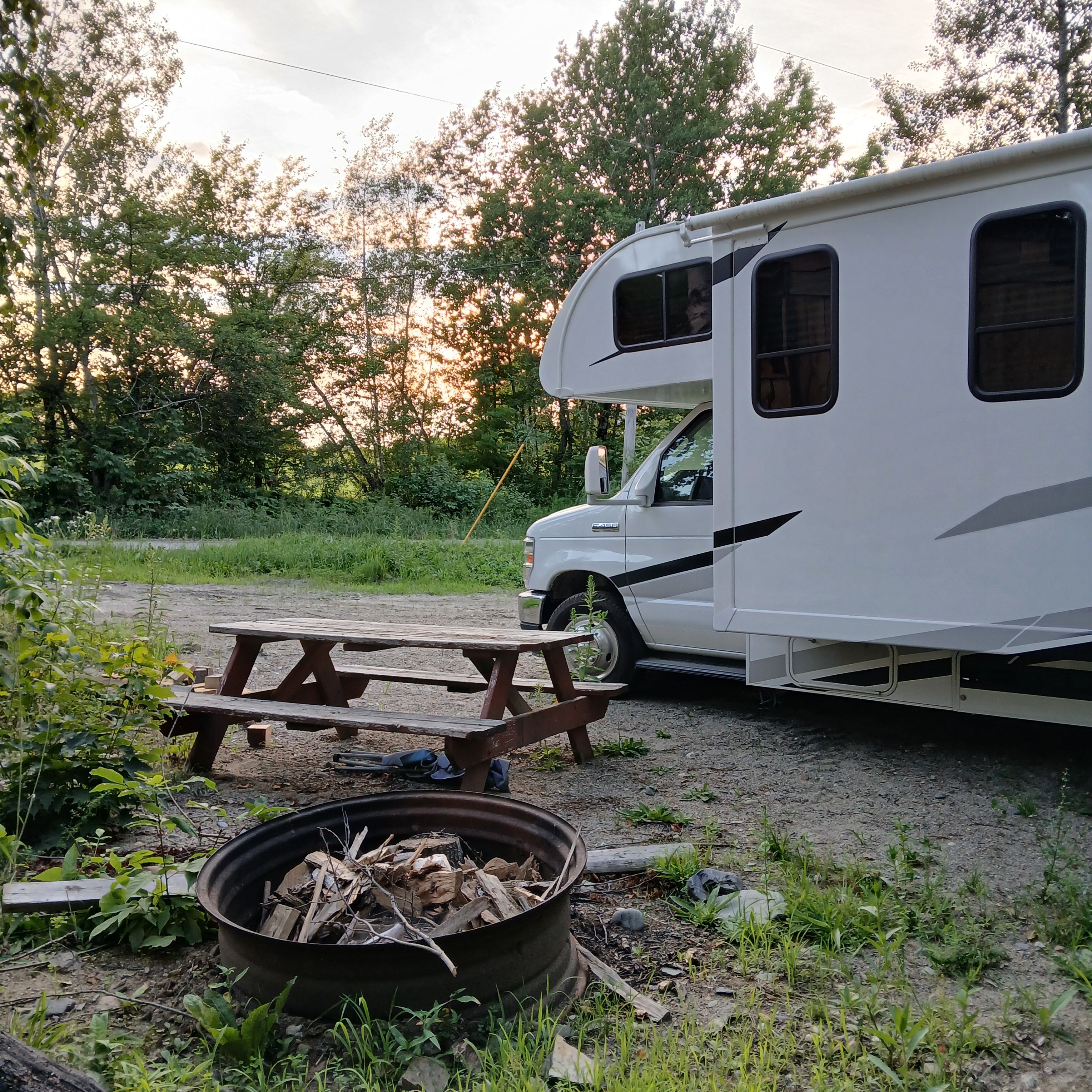 Picnic table and fire ring for roasting marshmallows.