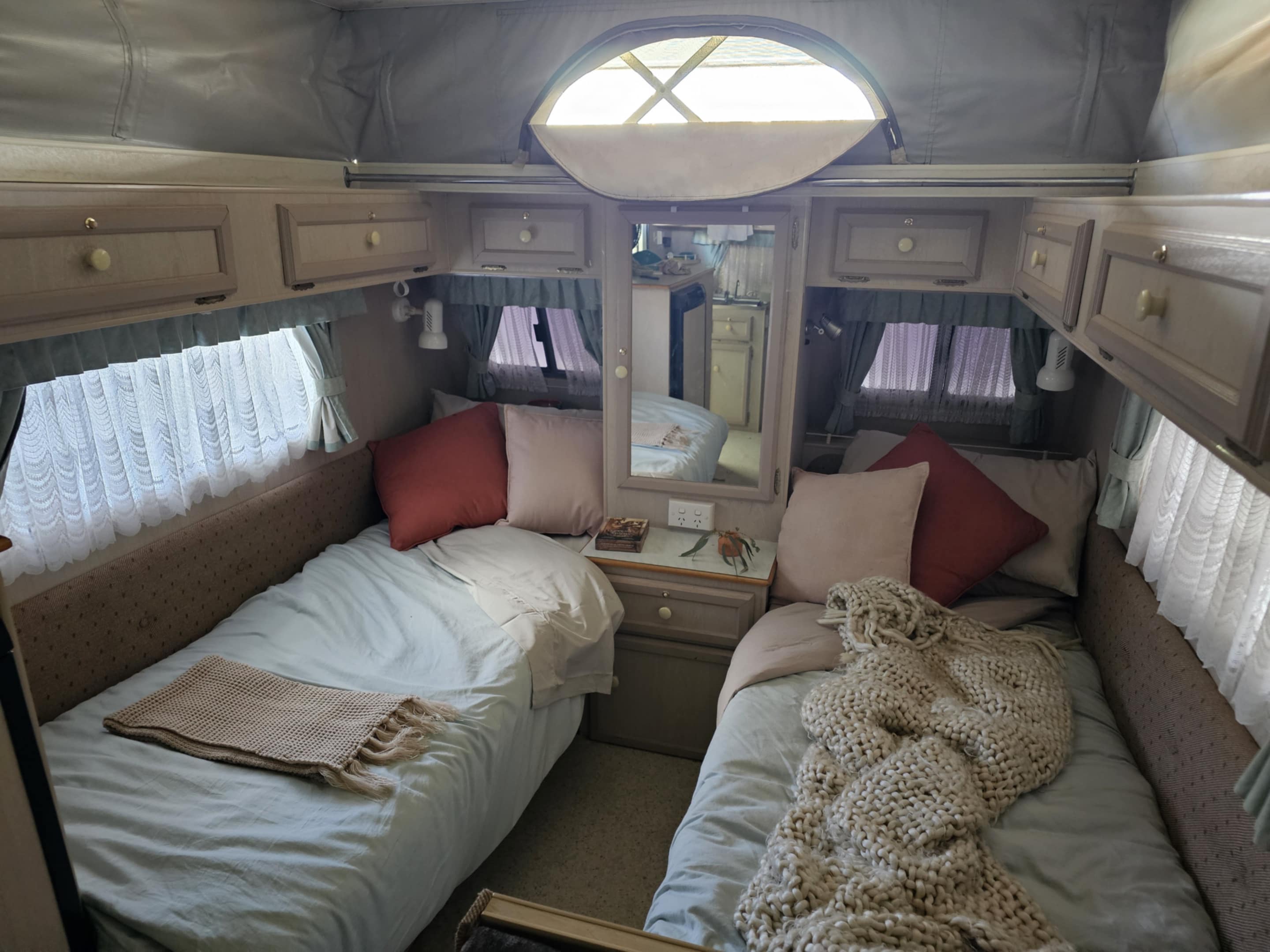 Soft linen, warm tones, and dreamy textures. Two single beds styled for comfort and calm.