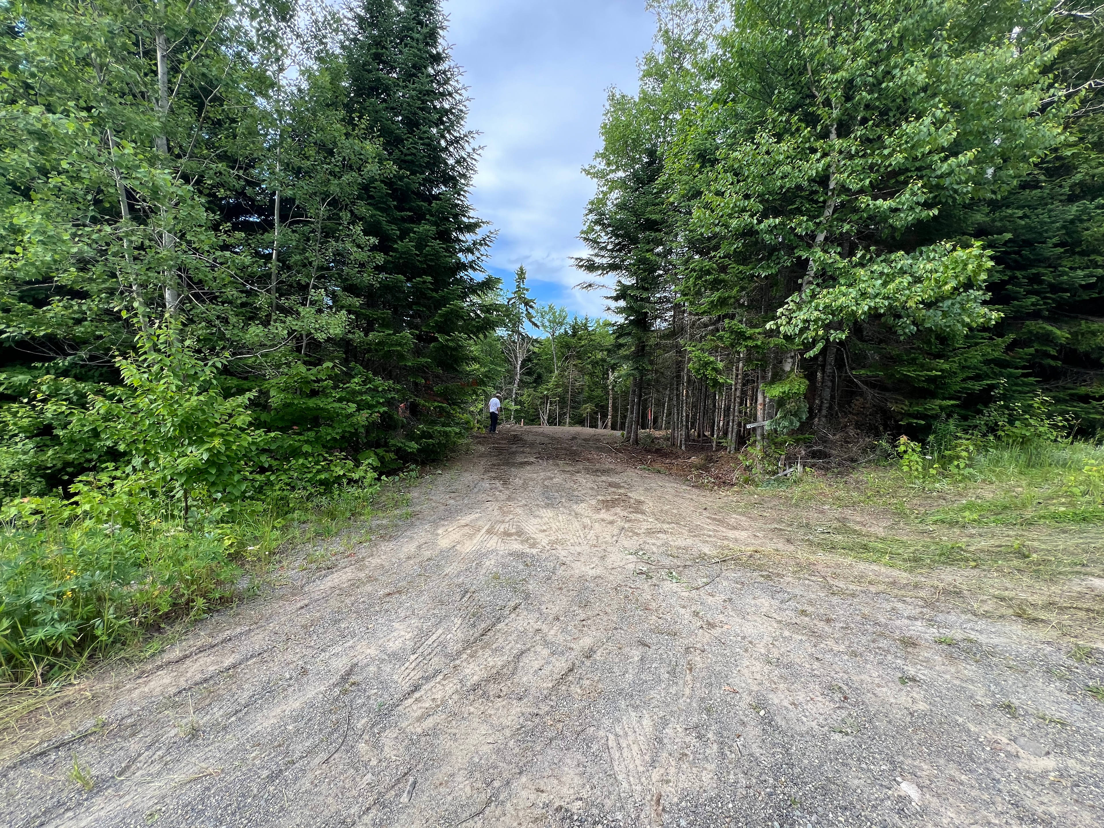Entrance to site from Mill Brook Rd.  Left turn into the site as you are heading uphill on Mill Brook Rd.  