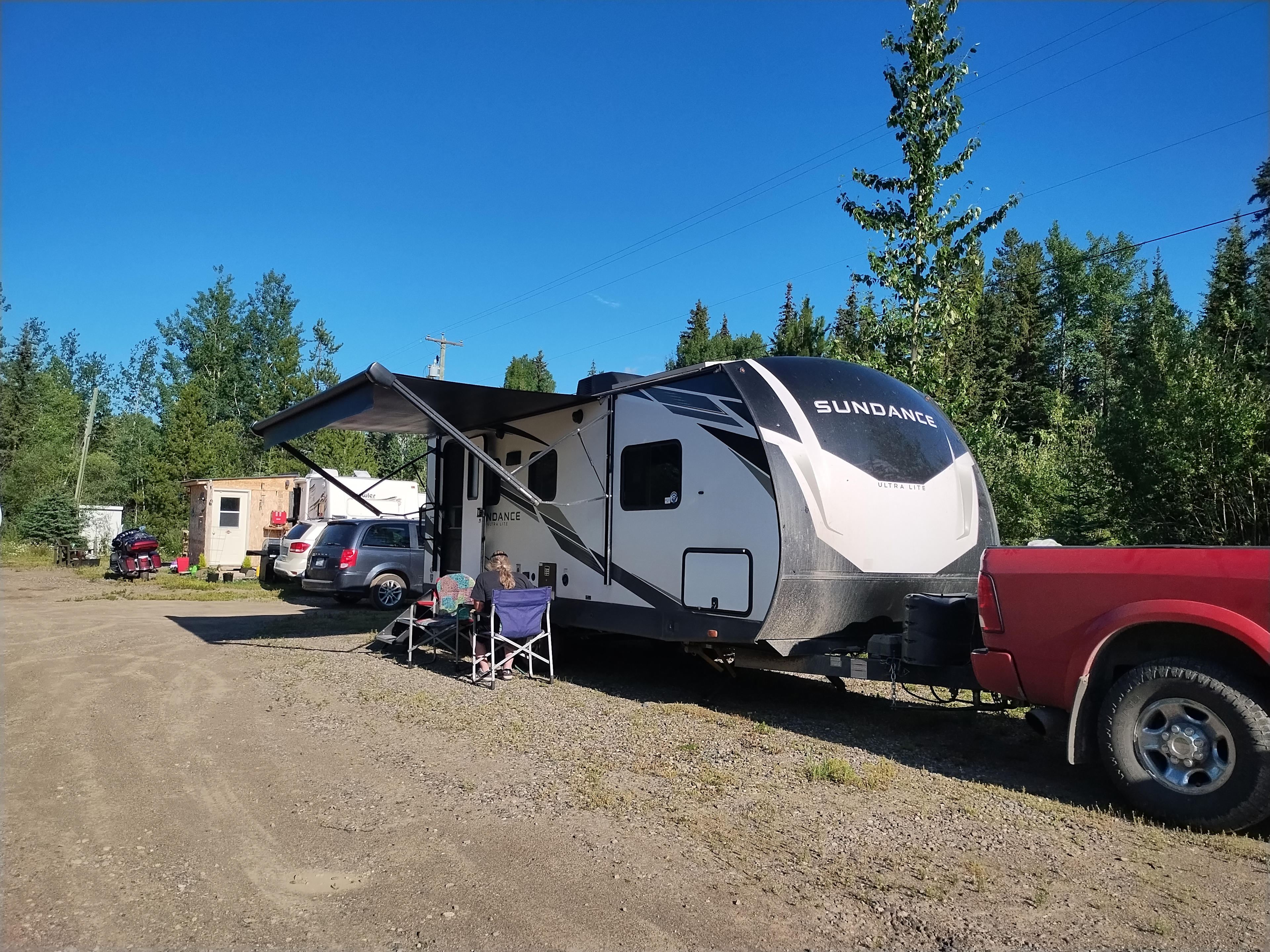 Picnic table and fire ring located across the road