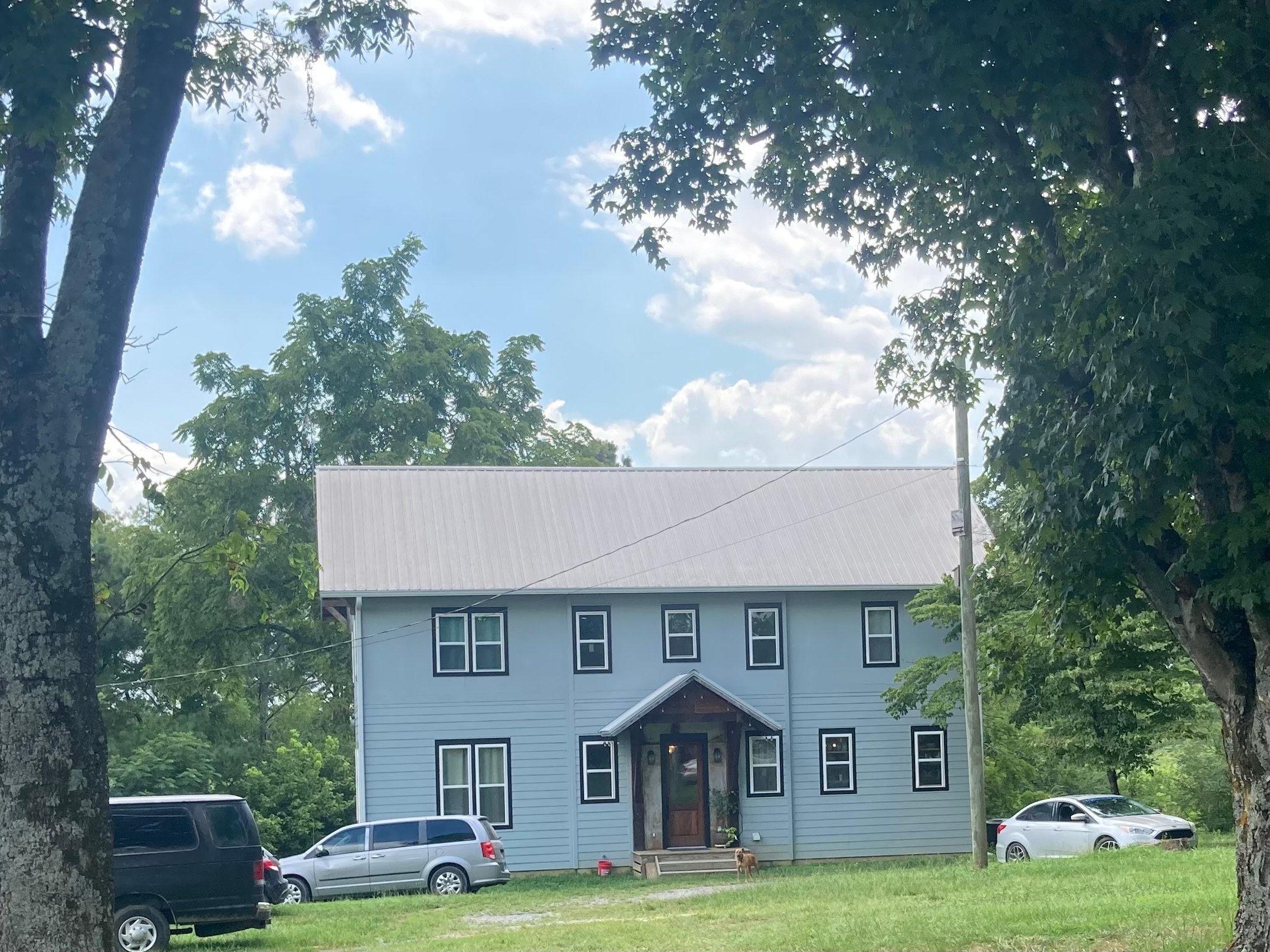 We live on the land in the timber framed house we built.