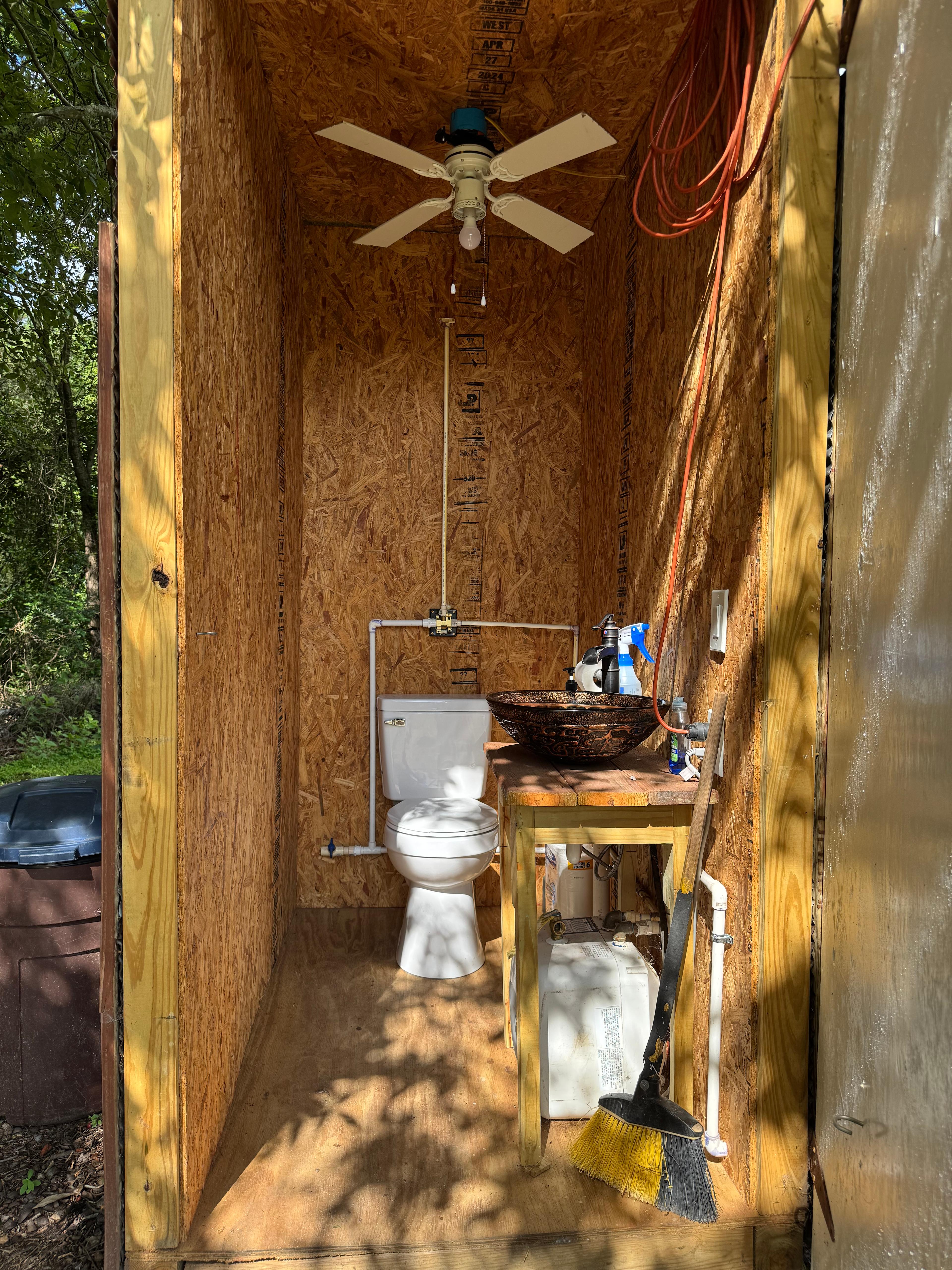 Nice clean bathroom - the ceiling fan is a great touch!