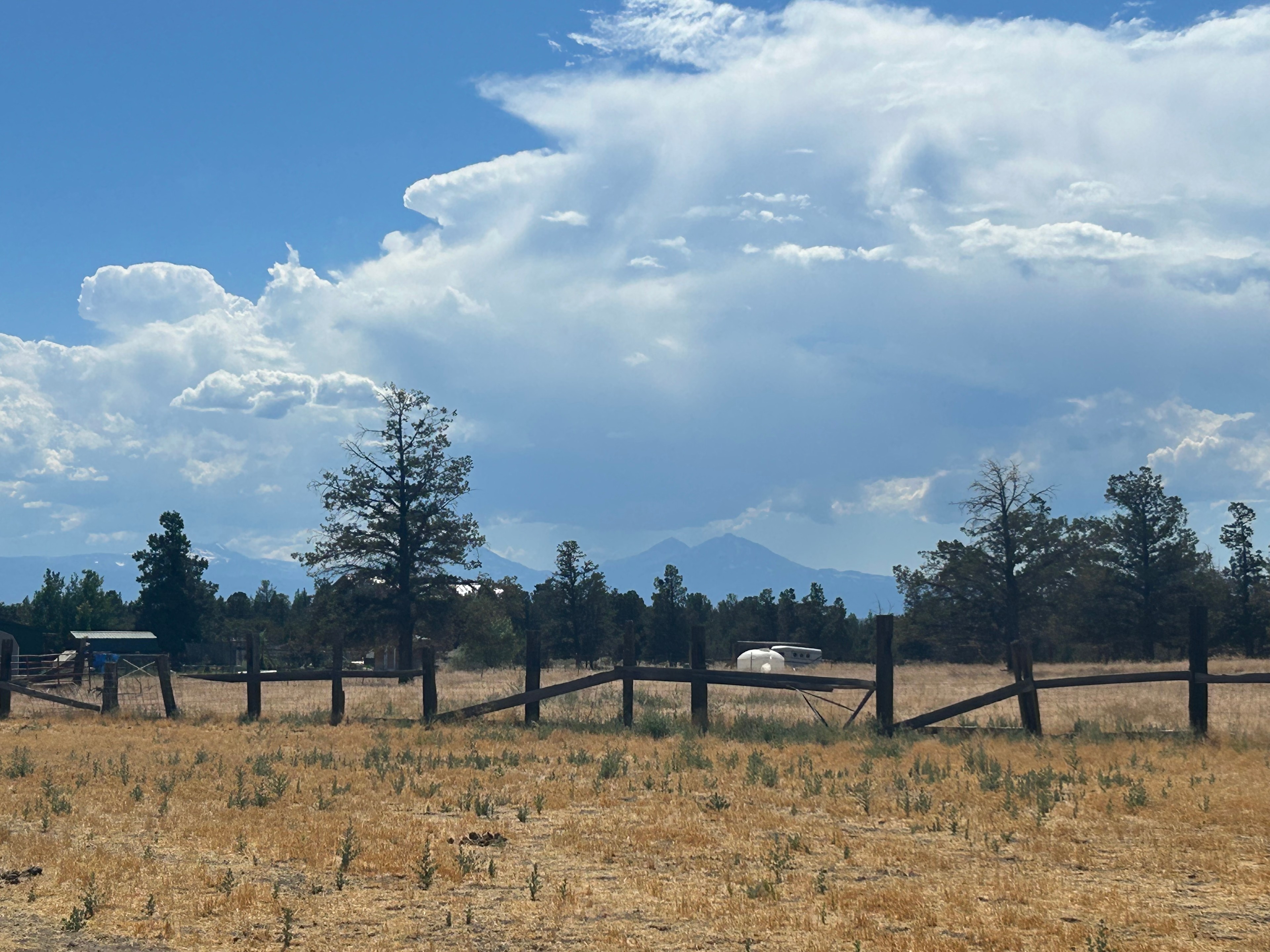 View of mountains with thunder clouds. 