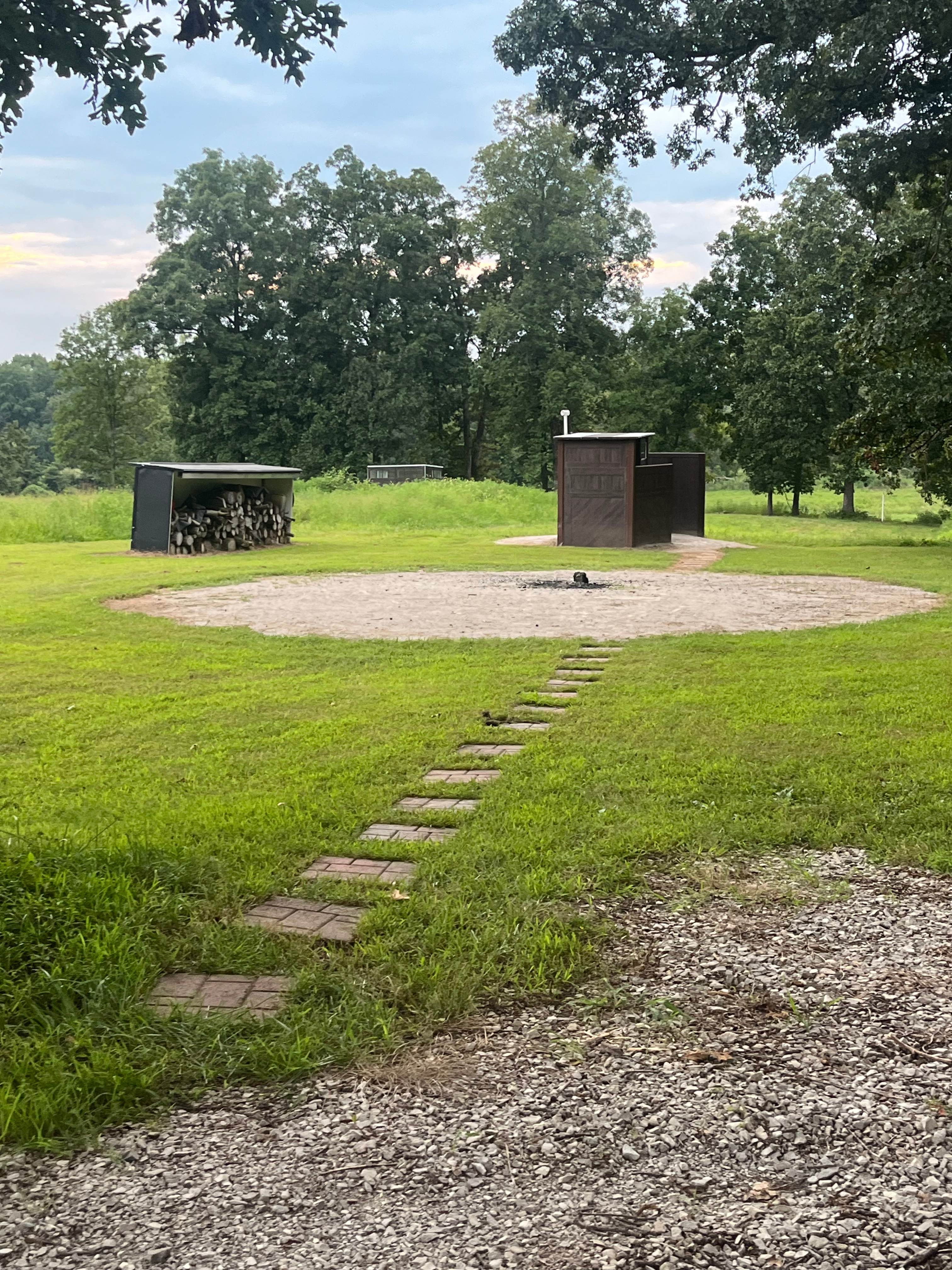 Fire pit, Outhouse, & Firewood storage