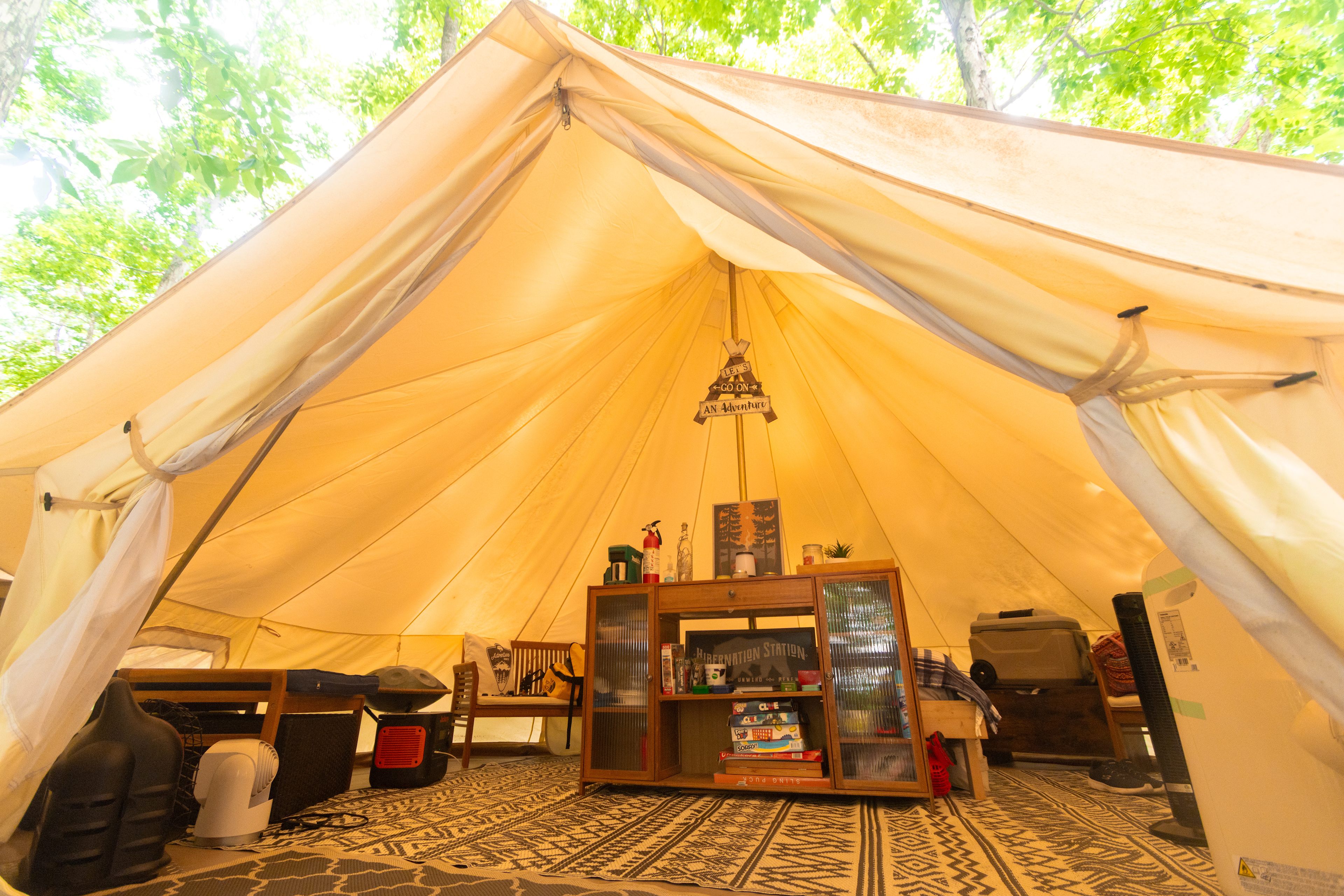 The tent comes equipped with a few fans, air conditioning, and a heater for the colder months