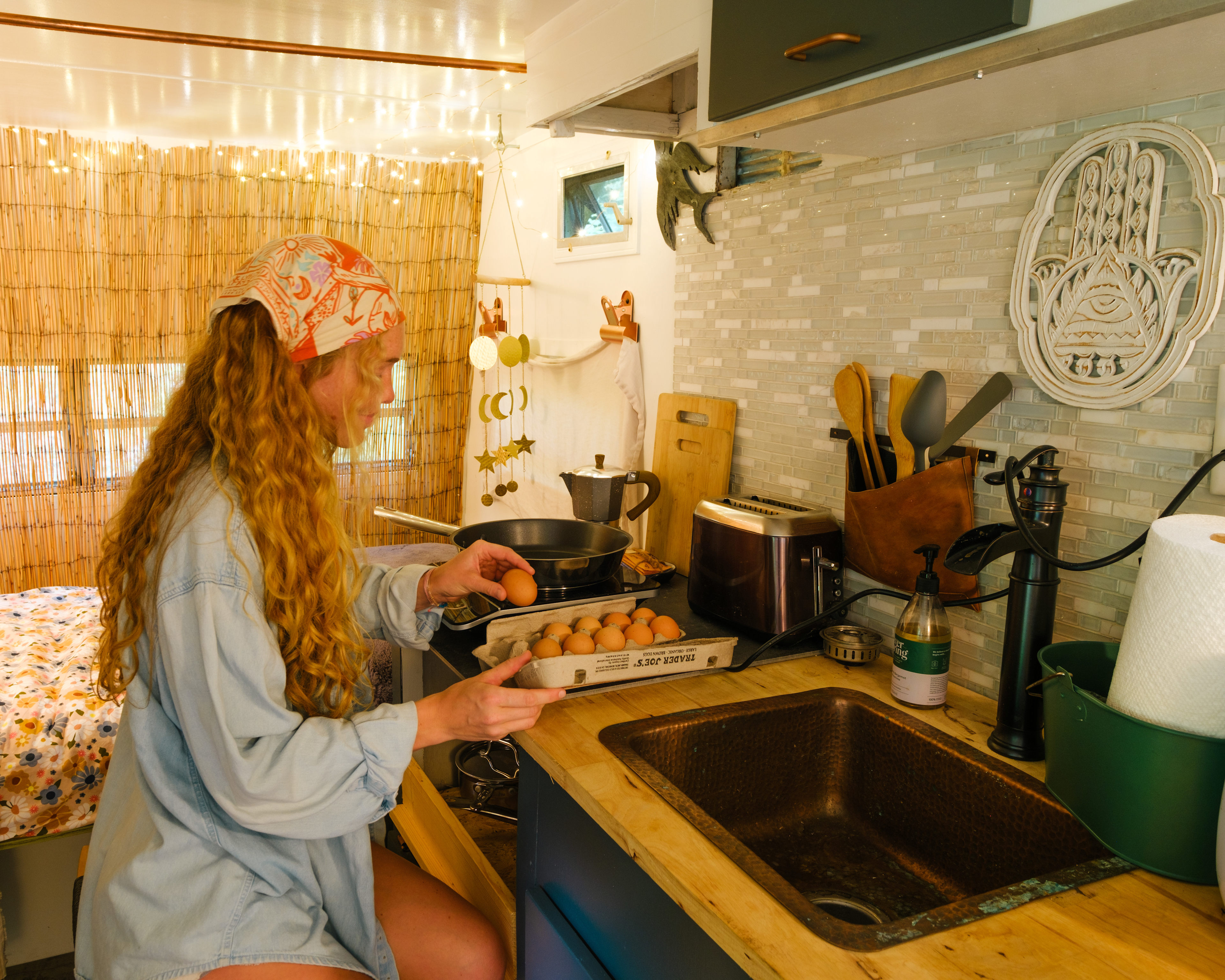 kitchen is stocked with two hot plates and pans!