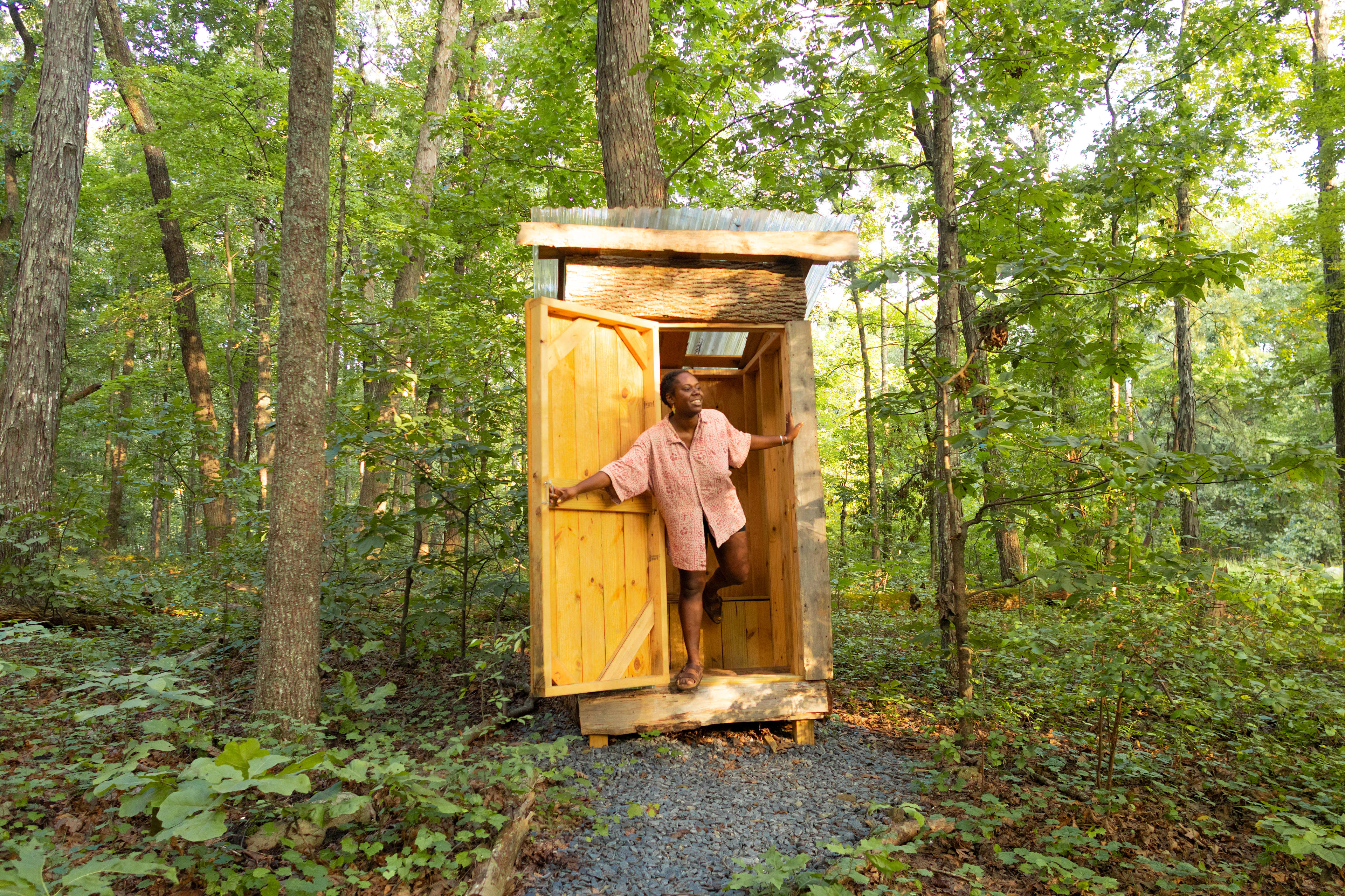 The outhouse is just a few steps from the main treehouse