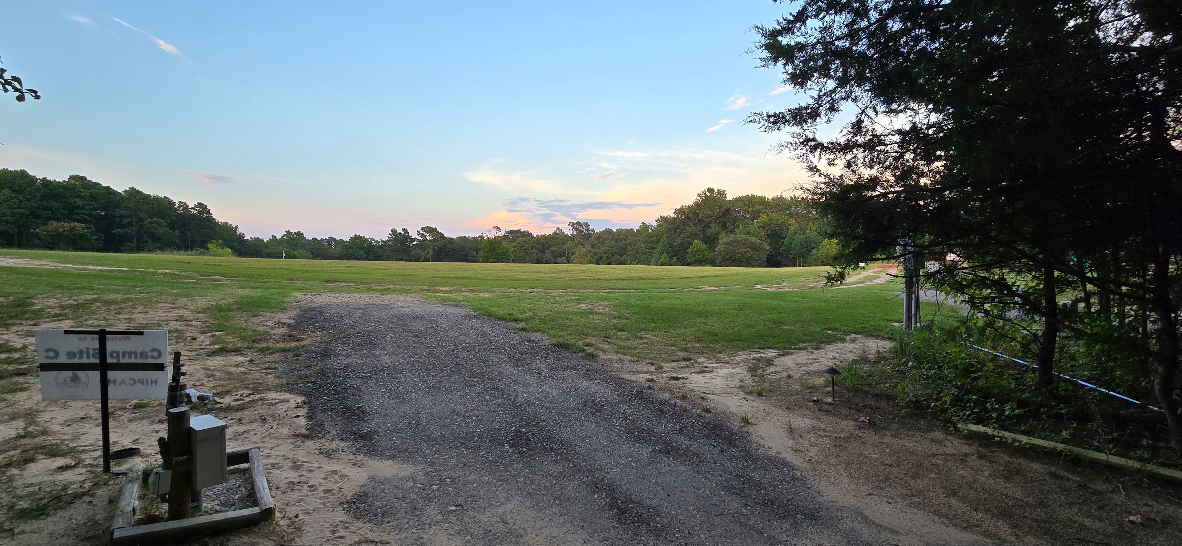 This is from Site C looking out onto our field where kids and dogs can run and play. We try to keep it mowed as much as possible.