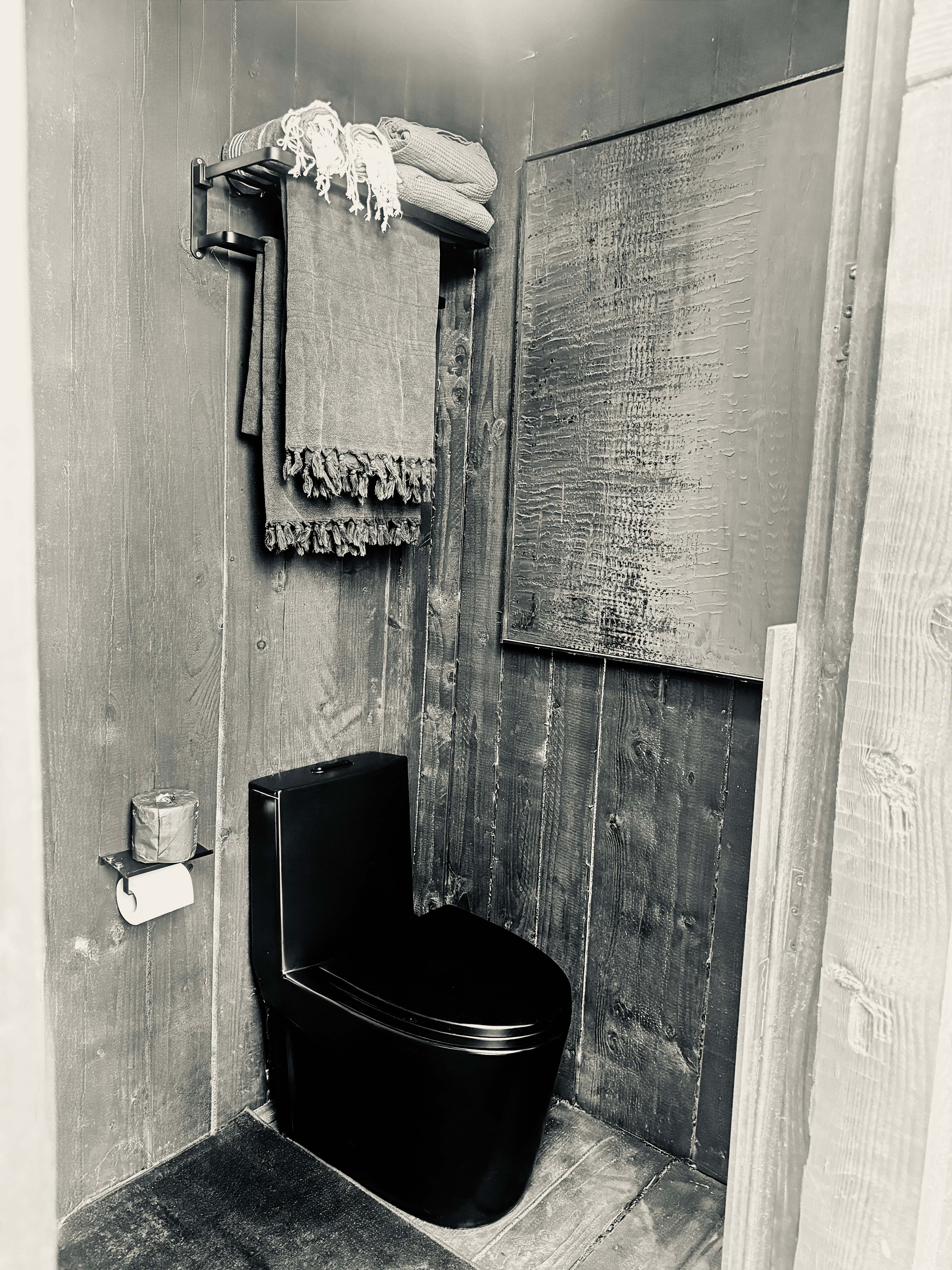 Private bathroom with flush toilet. 