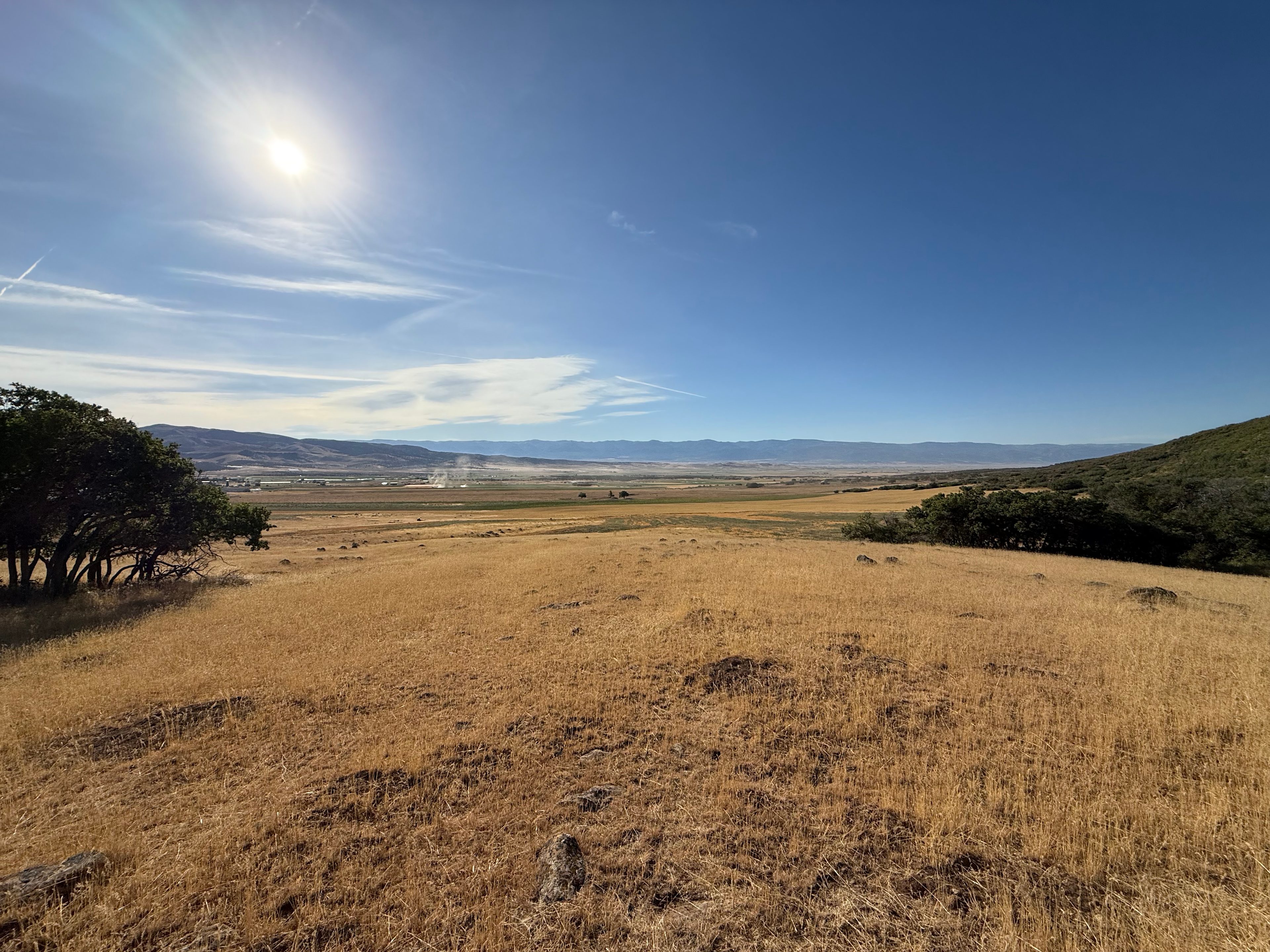 Hansen Hollows sits at nearly 6,000 feet on the edge of the Sanpete Valley — golden grass, big sky, and the Wasatch Plateau at your doorstep