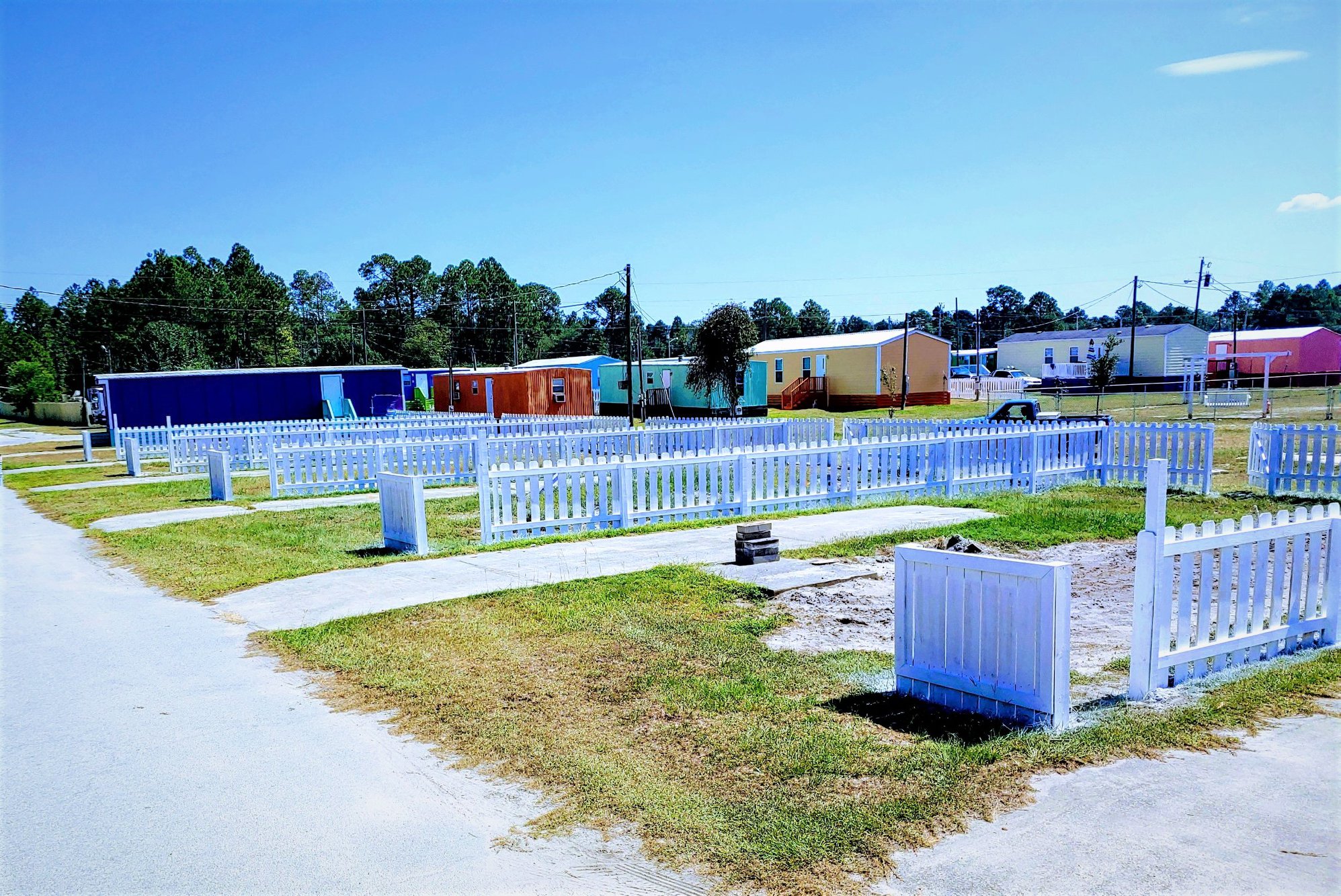 Happy Acres / Happy Campers / Happy Inn & Suites