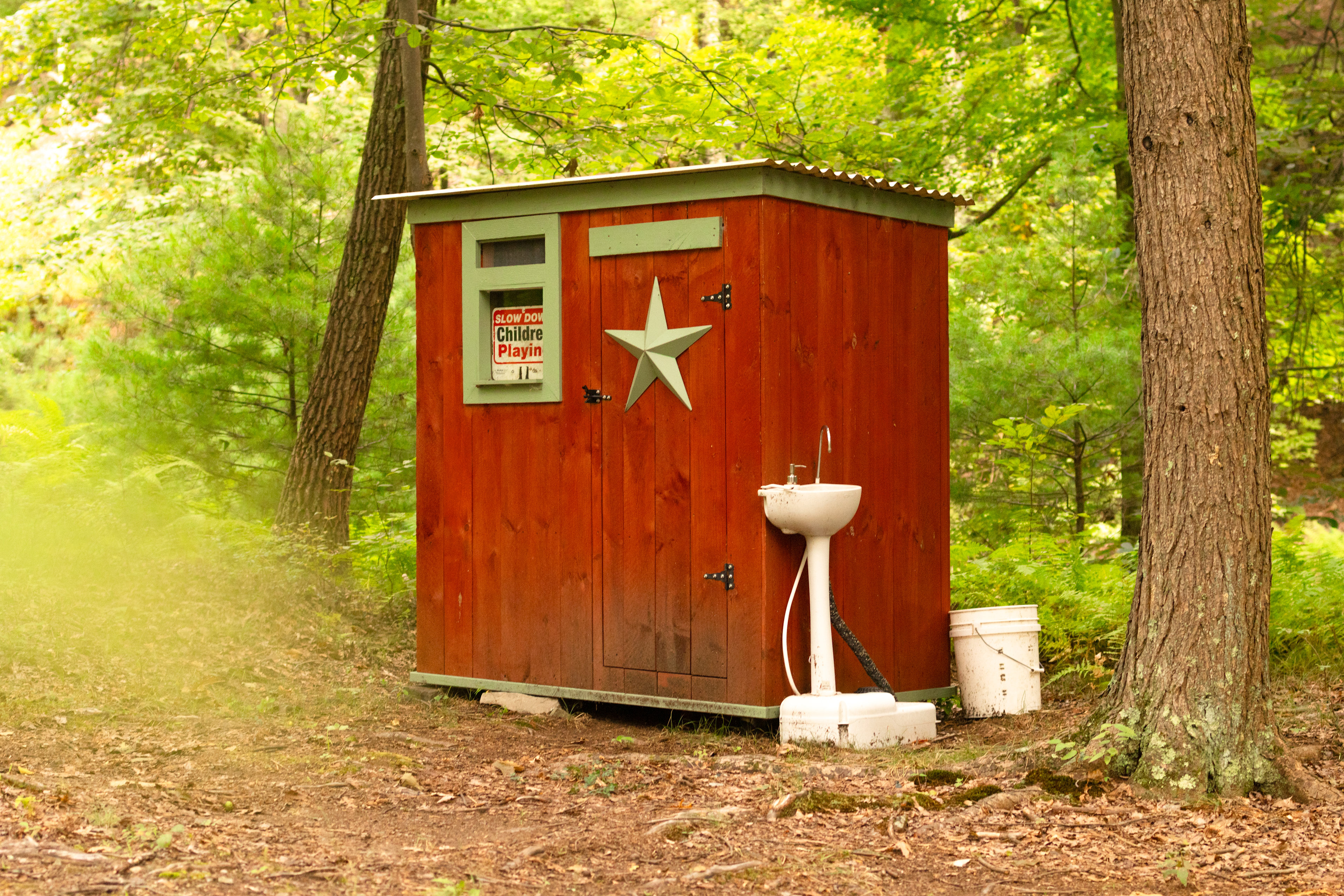 The outhouse next to the site is perfect for emergencies when you can't make it the full bathroom