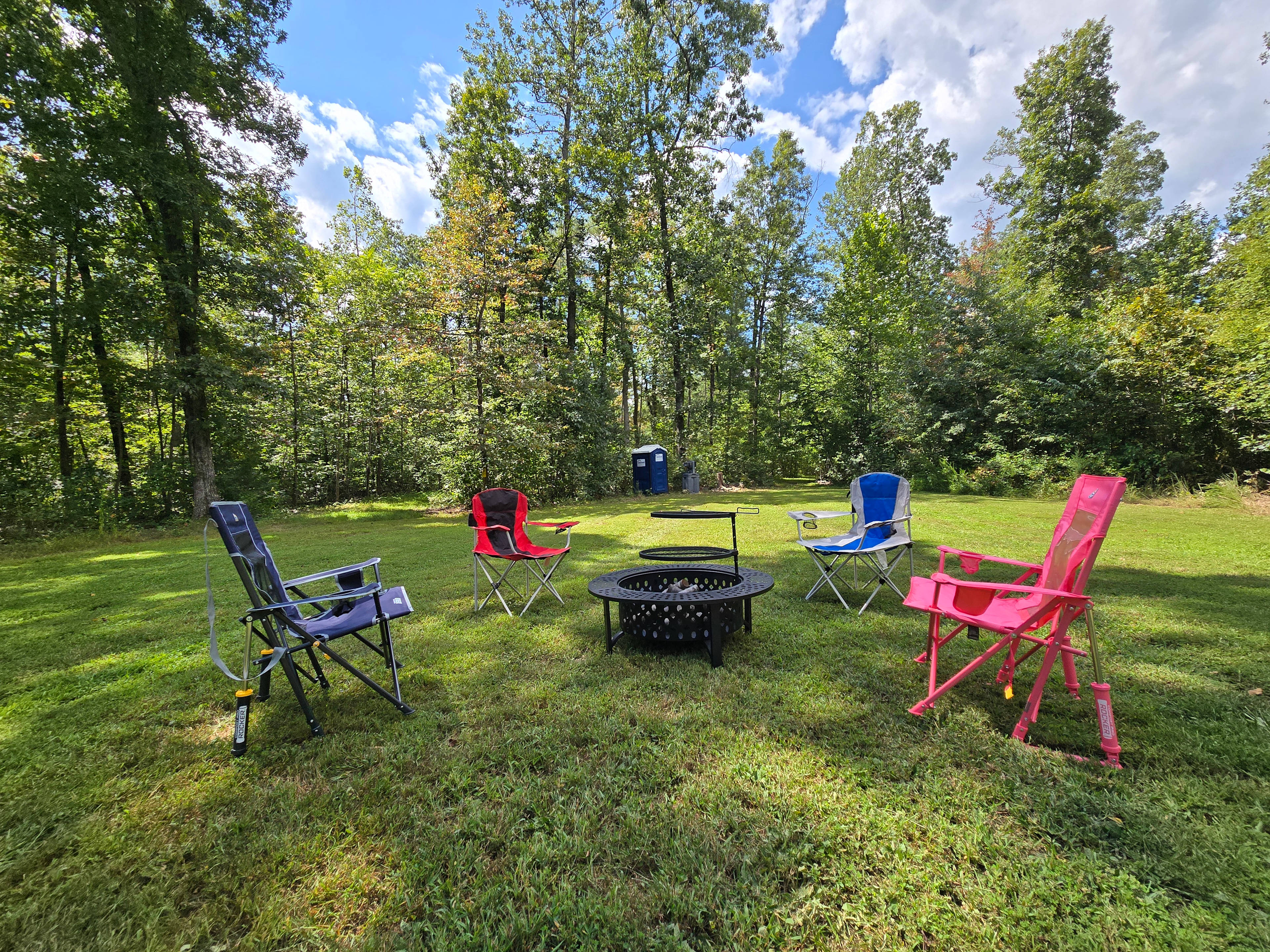 We provide a large grassy area, 42" firepit/grill, and port-a-potty, you provide the rest. Chairs not included 😉.