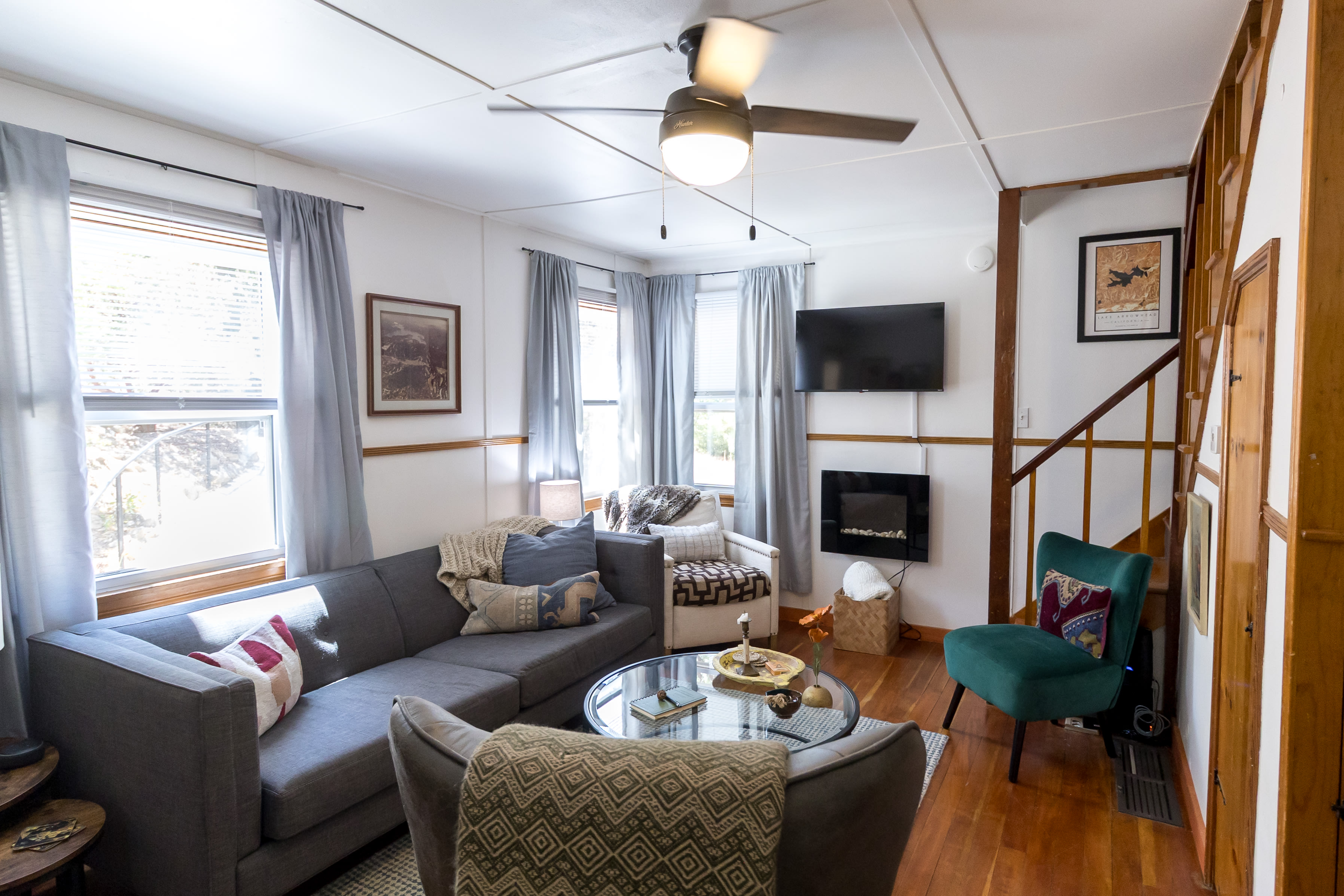 Cozy living room with a fireplace and the TV has all the streaming apps too! 