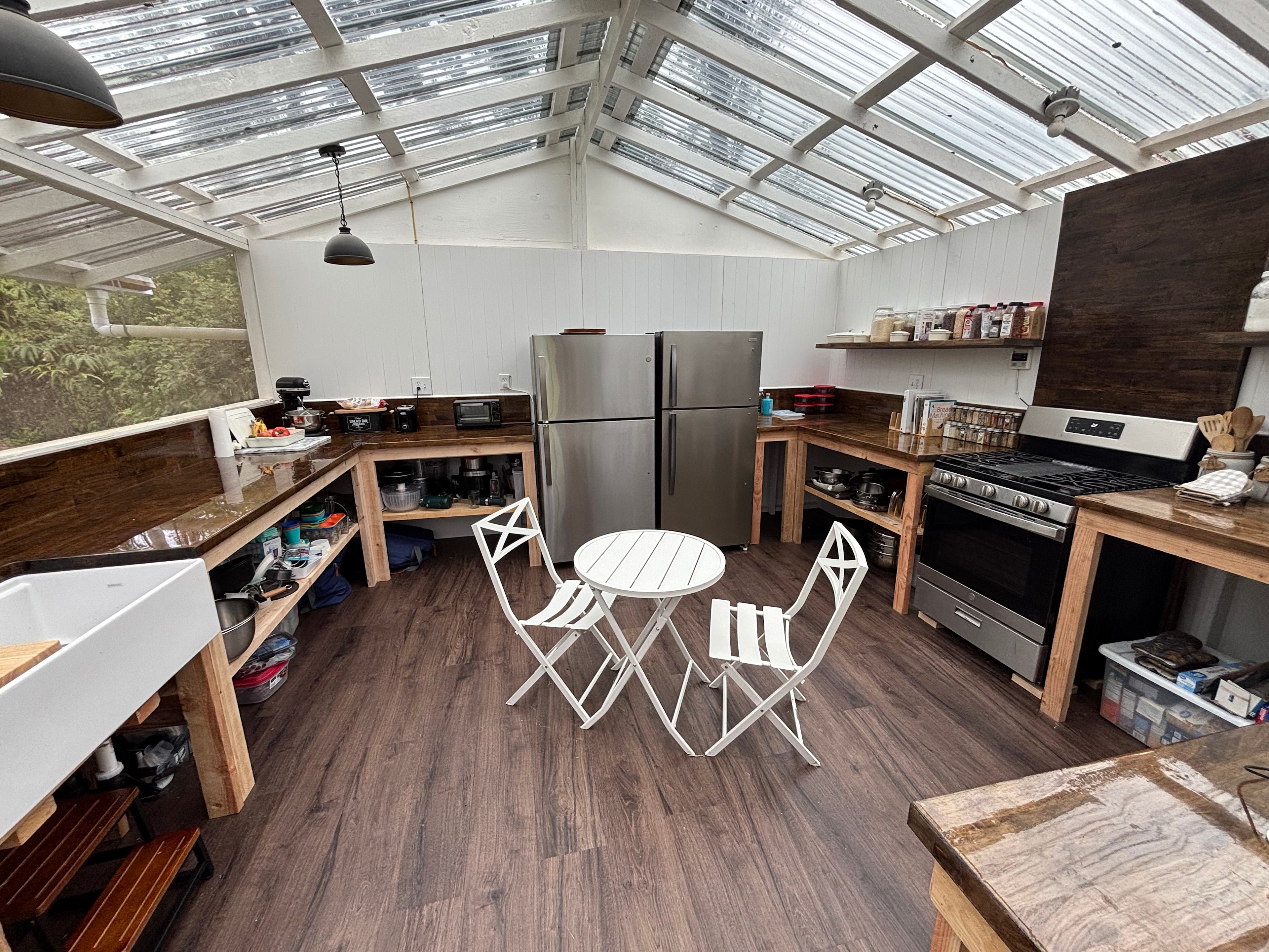 The kitchen is being renovated. It is fully functional and just needs more shelves, drawers, and cupboard doors. 