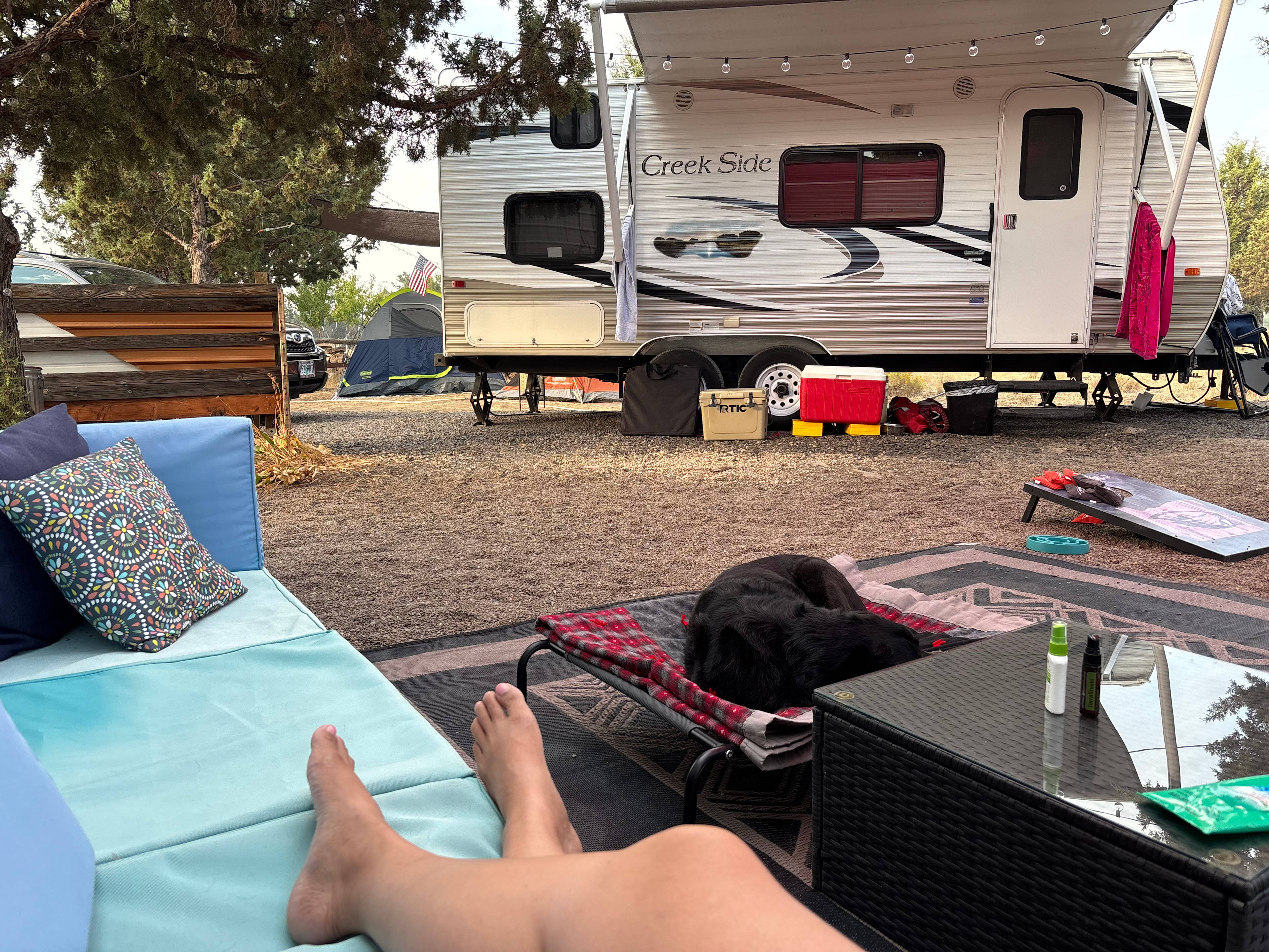 Outdoor Living Room w/our Camp Trailer