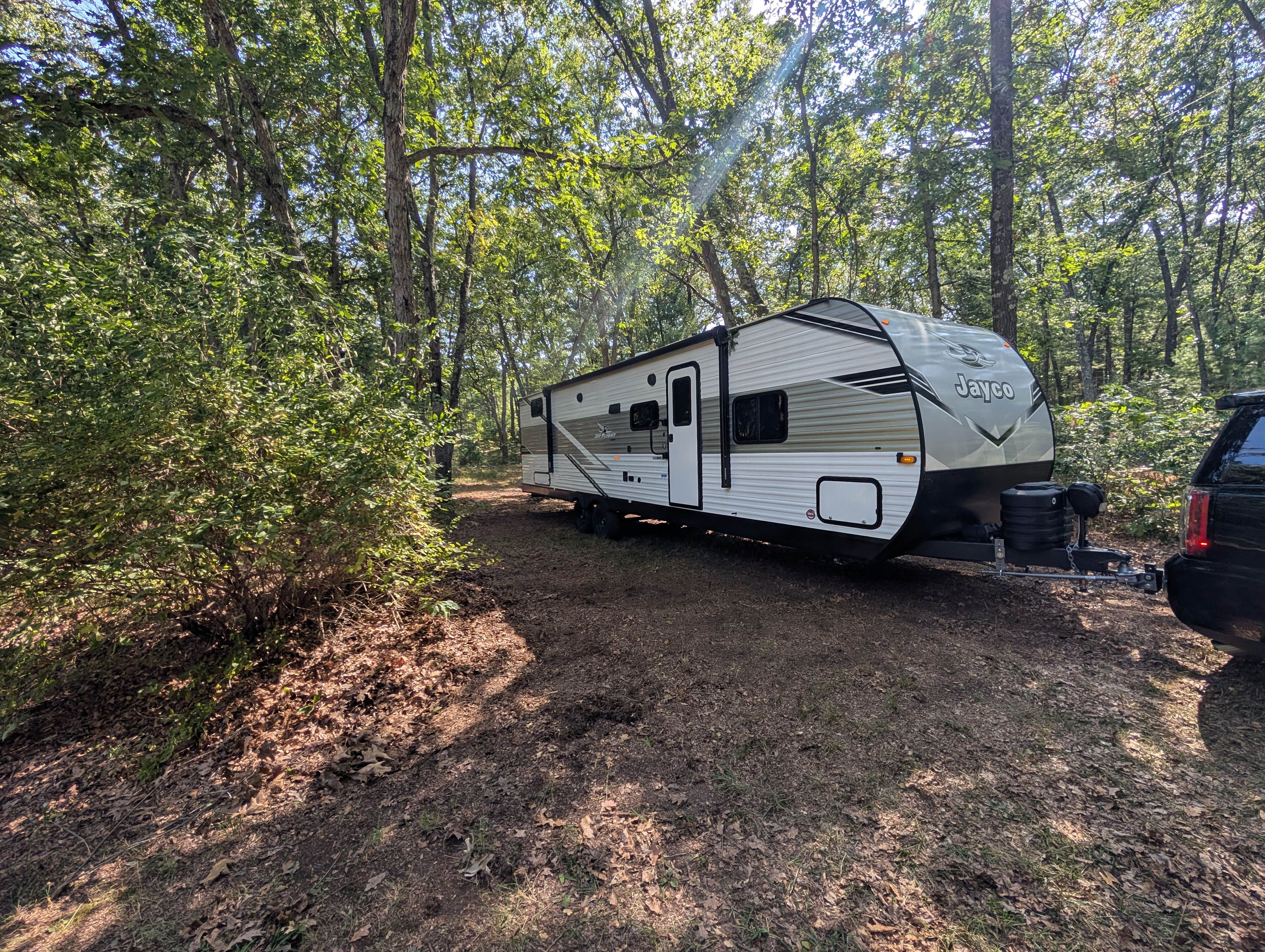 Blackberry Road (B1) can accomodate medium sized RV's currently. Future expansion / clearing of the site will allow for larger setups. 
